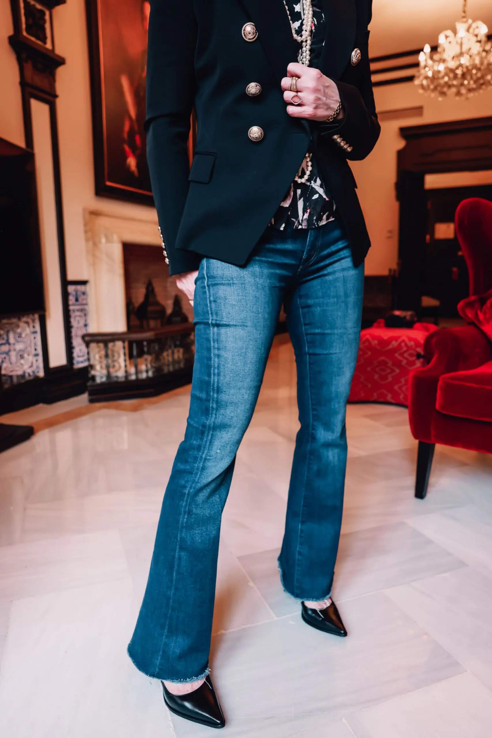 office outfits, stylish office outfits, chic office outfits, office outfits over 40, workwear over 40, stylish workwear, erin busbee, mother frayed hem flare jeans, balmain blazer, chanel multi strand necklace, iro printed blouse, black pointed toe pumps, sevilla, spain