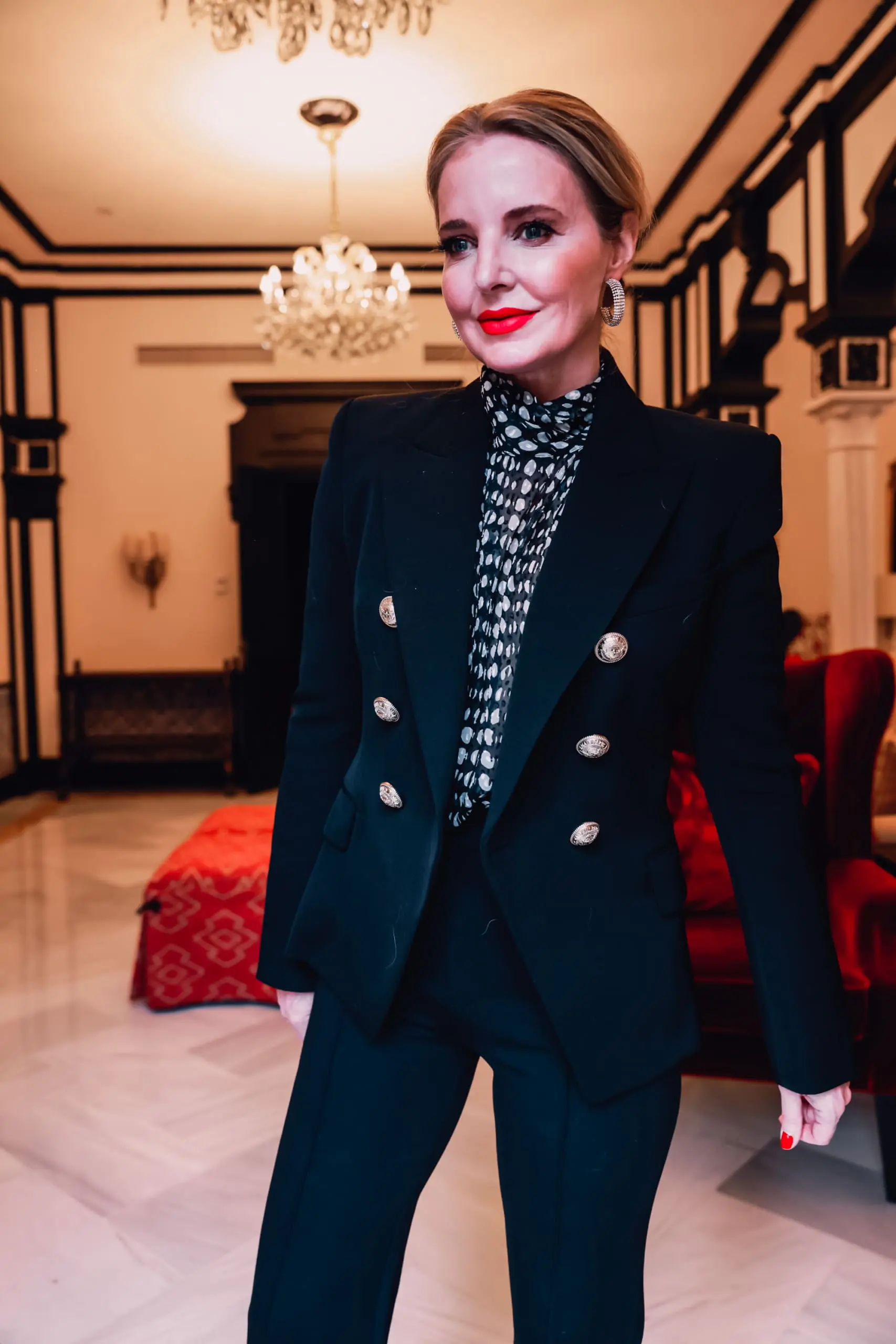 office outfits, stylish office outfits, chic office outfits, office outfits over 40, workwear over 40, stylish workwear, erin busbee, spanx wide leg pants, balmain blazer, pointed toe pumps, ba&sh black and white printed blouse, sevilla, spain