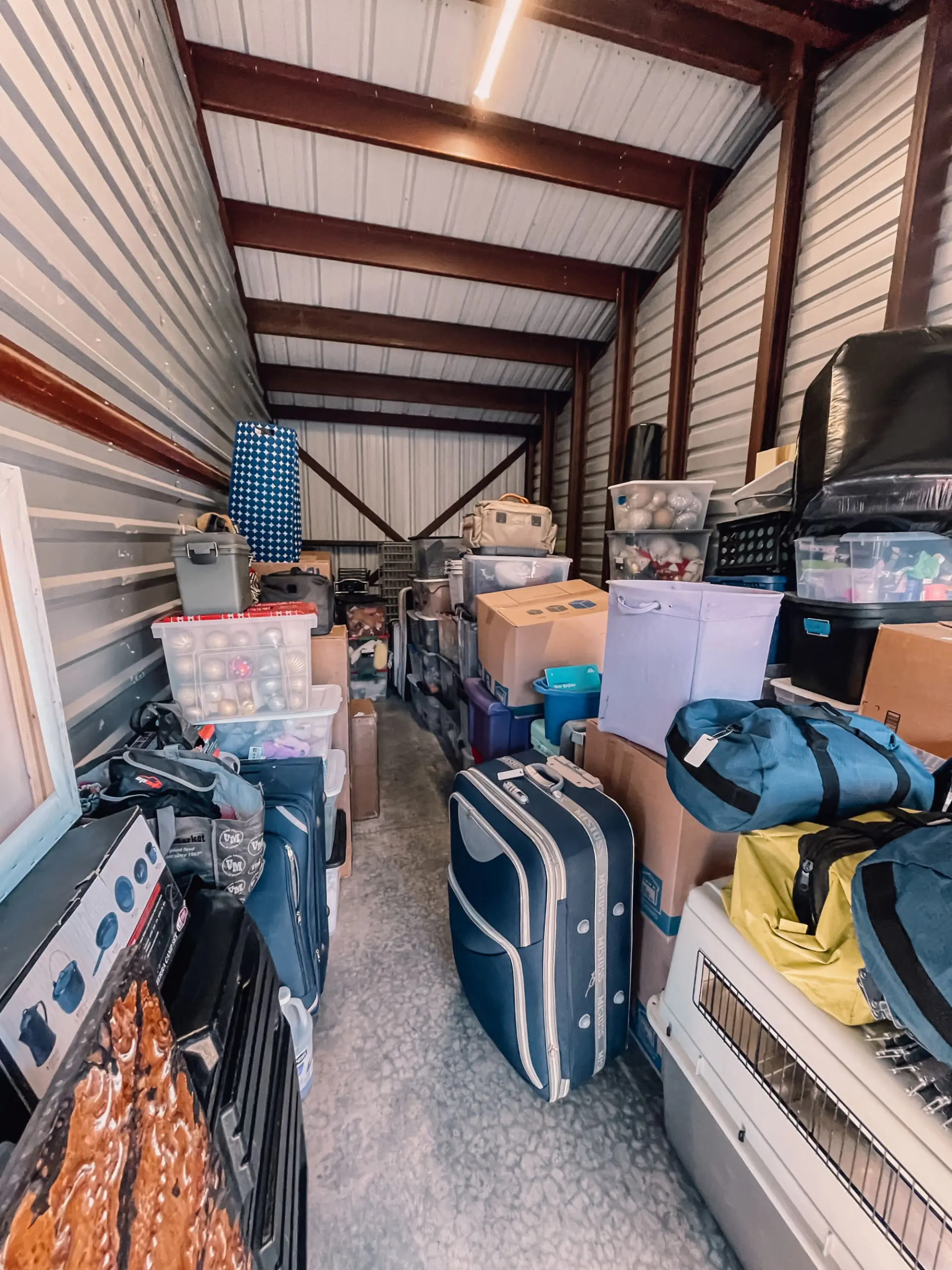 how to let go of things, erin busbee, antique tin mirror, storage unit telluride, why do I have a hard time letting go of things, how to let go of things with sentimental value, how to let go of things and move on, how to let go and declutter