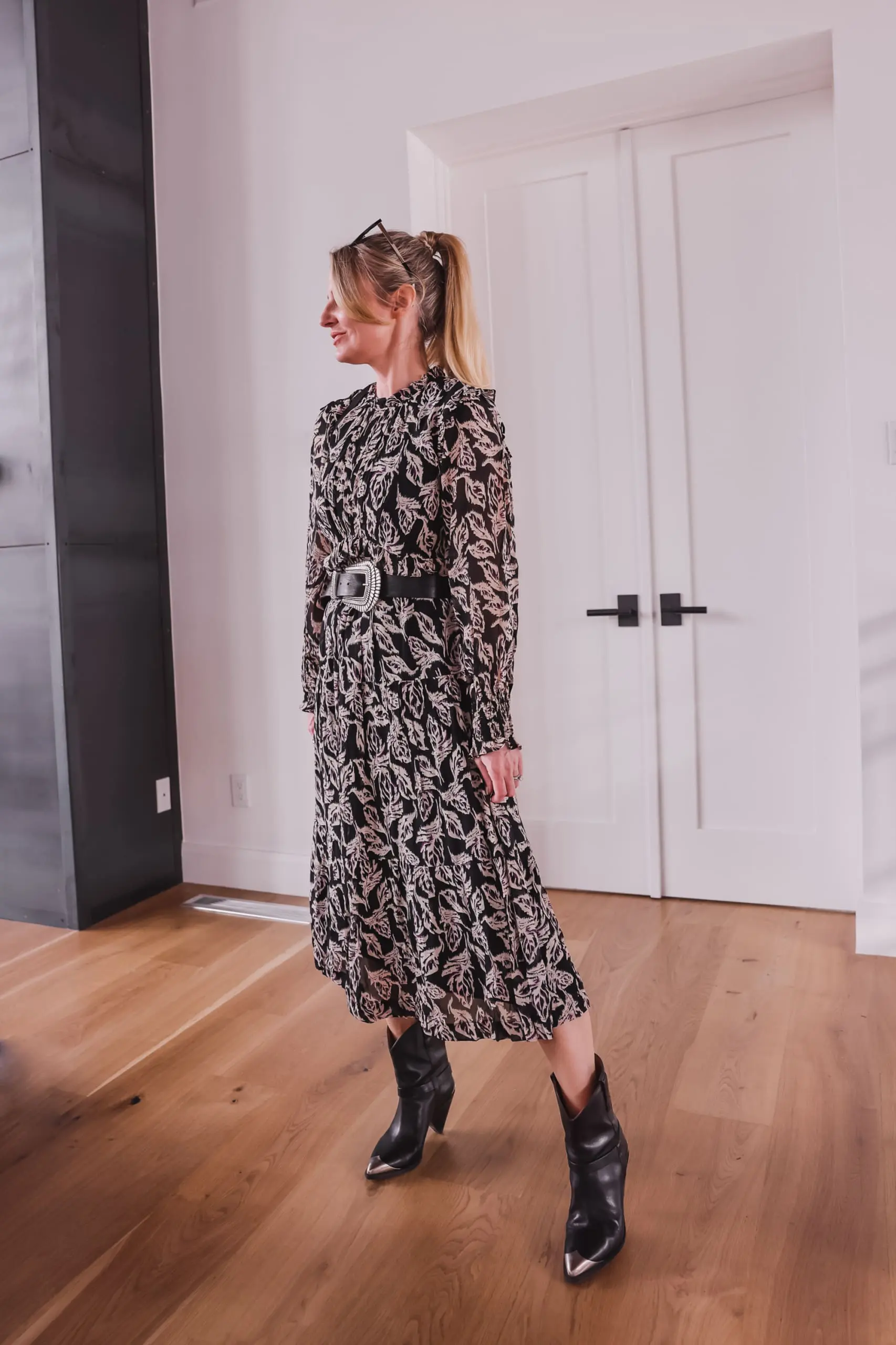 western trend, western trend 2022, western inspired trend, how to wear western trend, modern western style, erin busbee, busbee style. ba&sh printed midi dress, ba&sh teddy bag with buckle, ba&sh western inspired belt, isabel marant lamsey boots, telluride, colorado