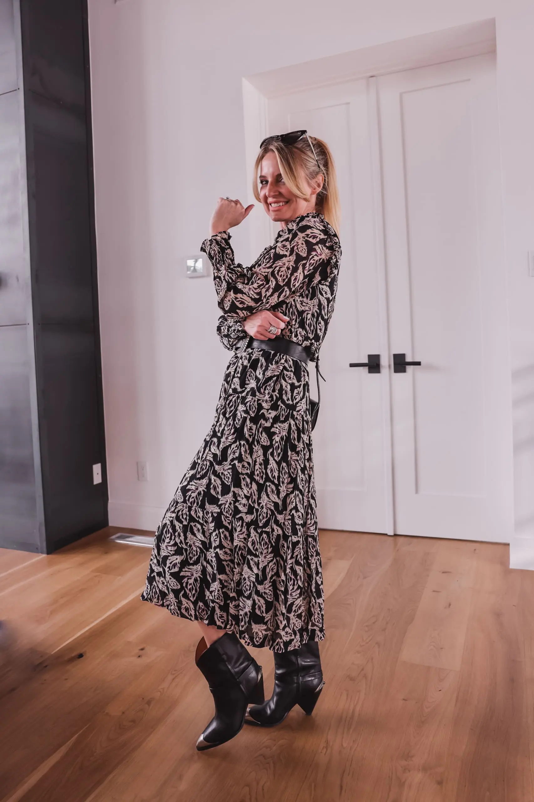 western trend, western trend 2022, western inspired trend, how to wear western trend, modern western style, erin busbee, busbee style. ba&sh printed midi dress, ba&sh teddy bag with buckle, ba&sh western inspired belt, isabel marant lamsey boots, telluride, colorado