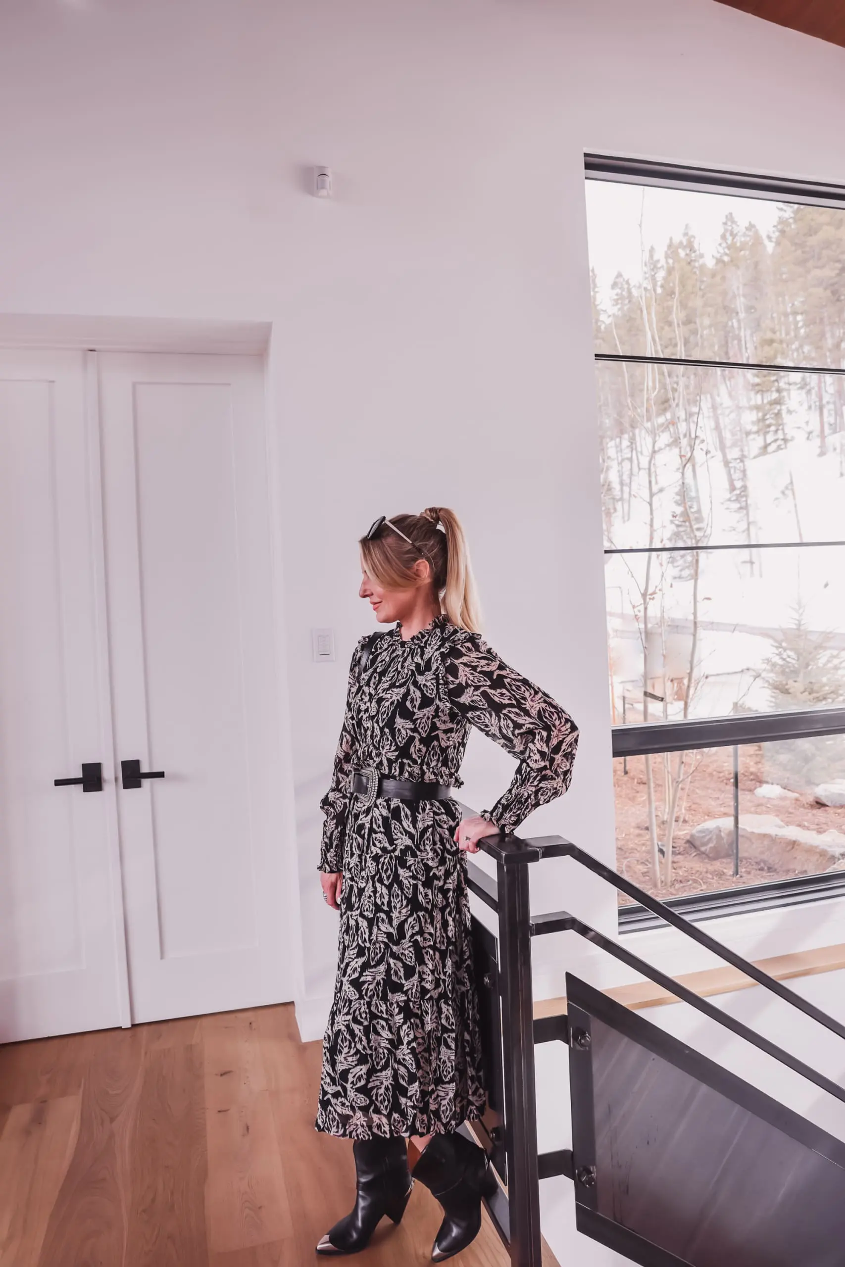 western trend, western trend 2022, western inspired trend, how to wear western trend, modern western style, erin busbee, busbee style. ba&sh printed midi dress, ba&sh teddy bag with buckle, ba&sh western inspired belt, isabel marant lamsey boots, telluride, colorado