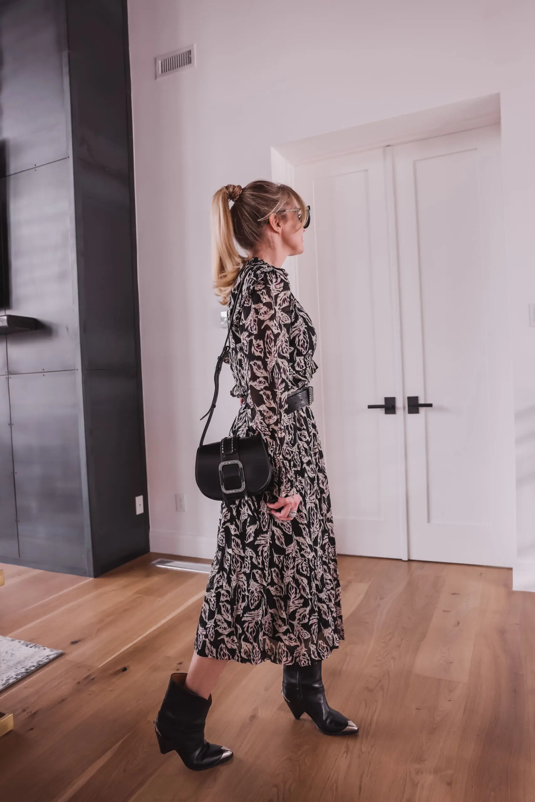 western trend, western trend 2022, western inspired trend, how to wear western trend, modern western style, erin busbee, busbee style. ba&sh printed midi dress, ba&sh teddy bag with buckle, ba&sh western inspired belt, isabel marant lamsey boots, telluride, colorado