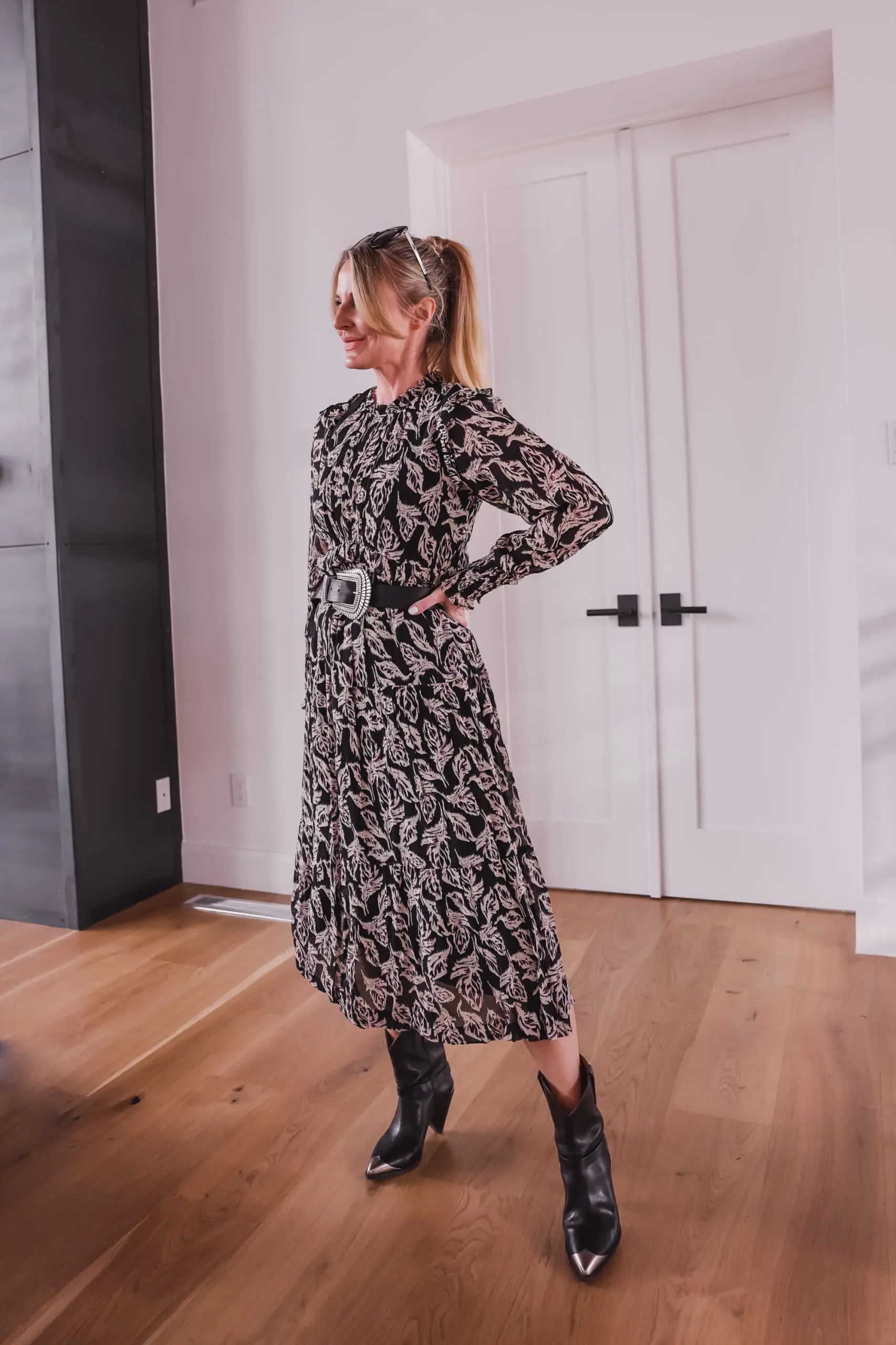 western trend, western trend 2022, western inspired trend, how to wear western trend, modern western style, erin busbee, busbee style. ba&sh printed midi dress, ba&sh teddy bag with buckle, ba&sh western inspired belt, isabel marant lamsey boots, telluride, colorado