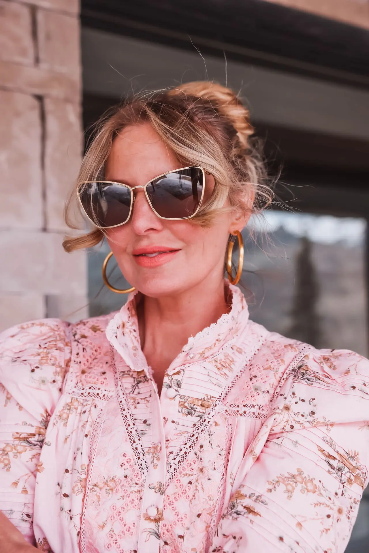 summer self care, summer self care essentials, sun protection, maui jim sunglasses, polarized sunglasses, puakenikeni sunglasses by maui jim, erin busbee, busbee style, telluride, colorado, loveshackfancy pink floral blouse, alice + olivia wide leg jeans, vince camuto booties, dean davidson gold hoops