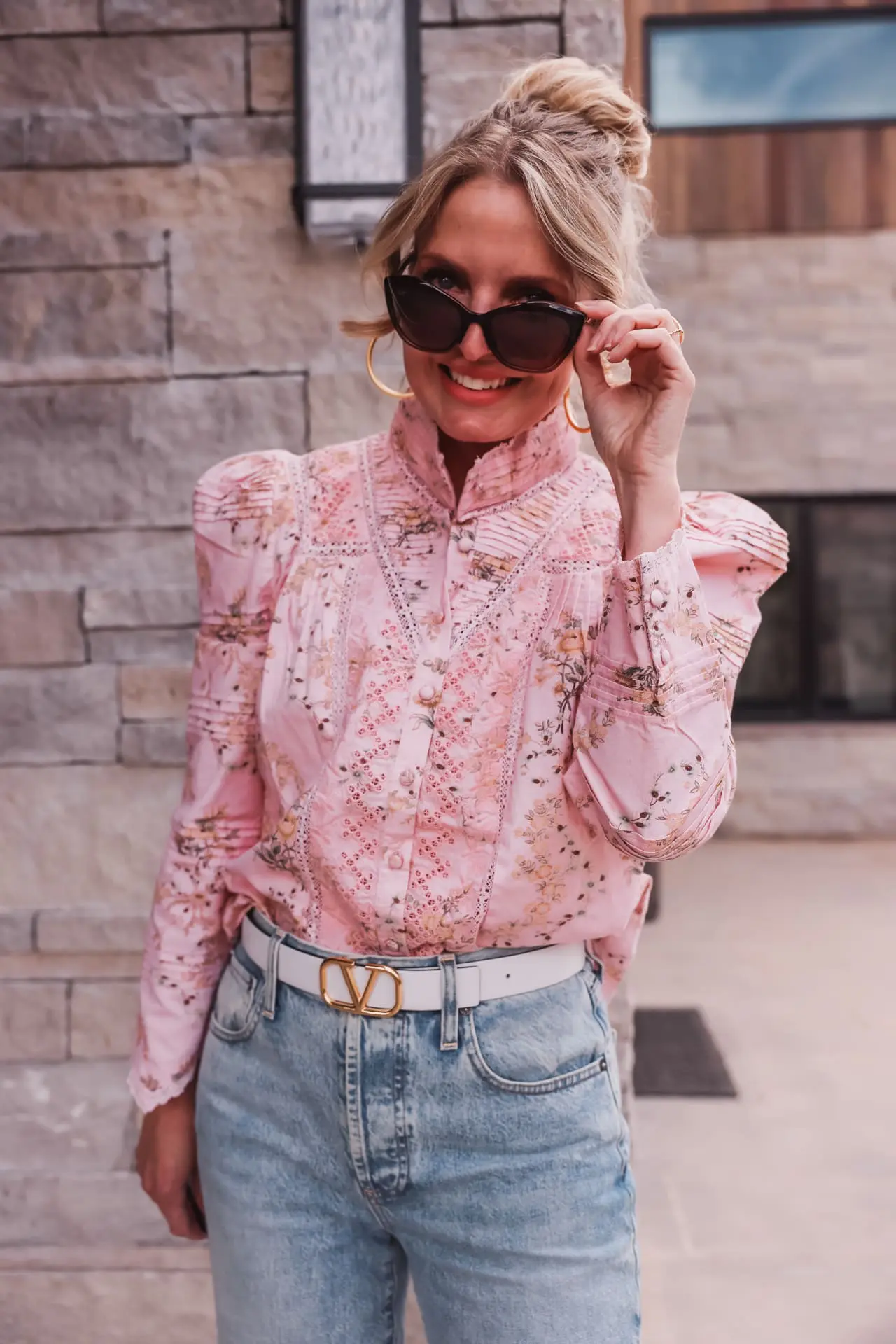 summer self care, summer self care essentials, sun protection, maui jim sunglasses, polarized sunglasses, maui jim sunglasses, lotus sunglasses by maui jim, erin busbee, busbee style, telluride, colorado, loveshackfancy pink floral blouse, alice + olivia wide leg jeans, vince camuto booties, dean davidson gold hoops