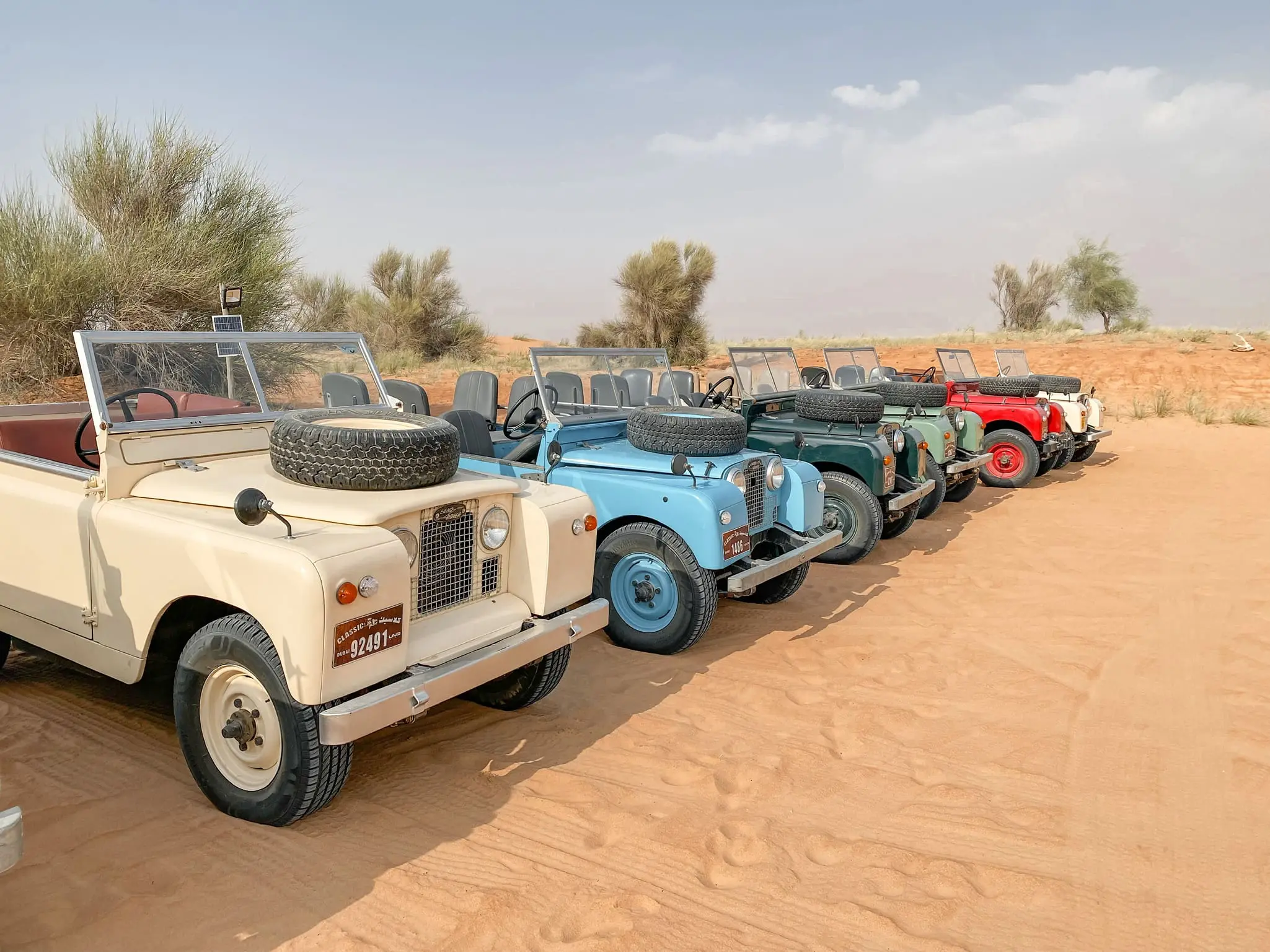 planning a trip to the middle east, where to go in the middle east, how to plan a trip to the middle east, dubai, united arab emirates, UAE, erin busbee, busbee style, busbee family travels, desert safari, platinum heritage desert safari, riding camels, falcons in the desert, jeep ride in desert, the empty quarter