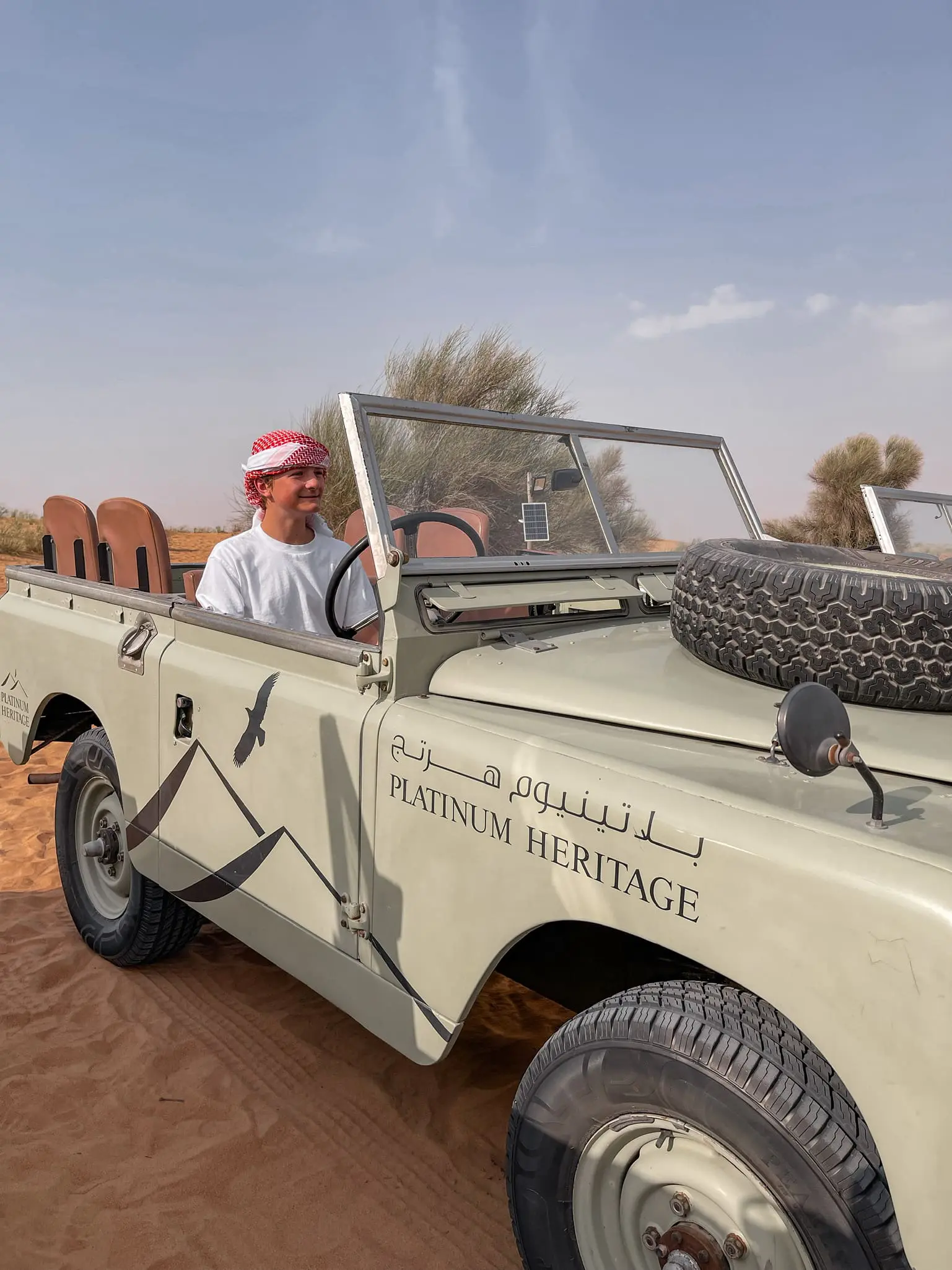 planning a trip to the middle east, where to go in the middle east, how to plan a trip to the middle east, dubai, united arab emirates, UAE, erin busbee, busbee style, busbee family travels, desert safari, platinum heritage desert safari, riding camels, falcons in the desert, jeep ride in desert, the empty quarter