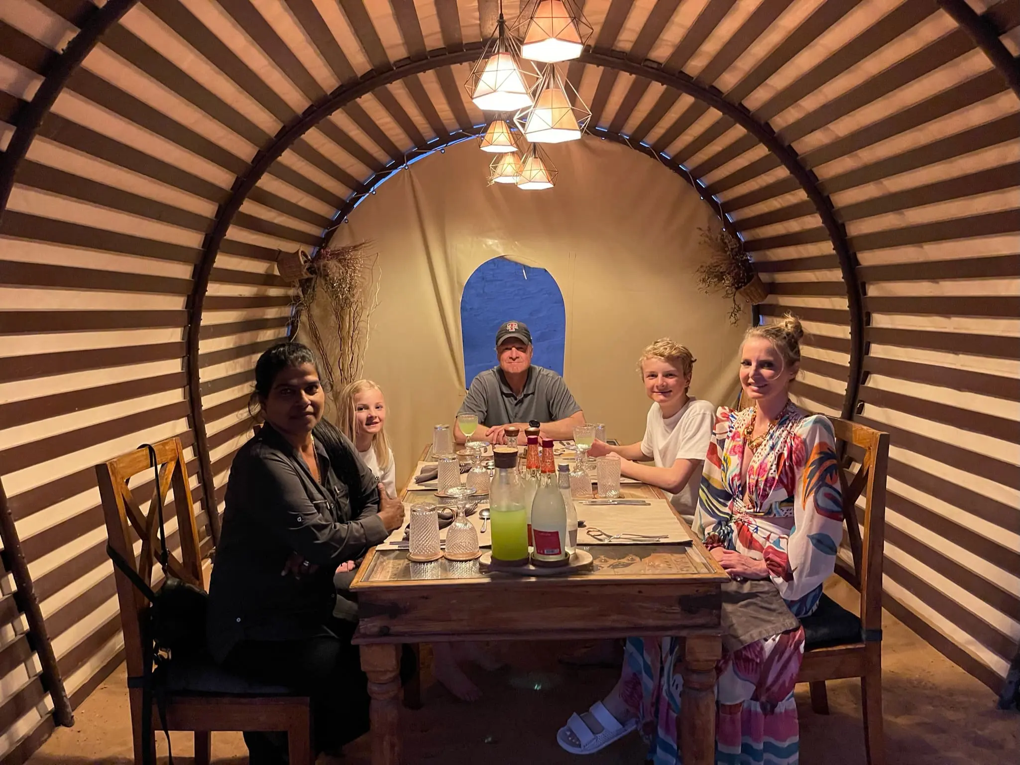 planning a trip to the middle east, where to go in the middle east, how to plan a trip to the middle east, dubai, united arab emirates, UAE, erin busbee, busbee style, busbee family travels, desert safari, platinum heritage desert safari, riding camels in desert, dinner in the desert