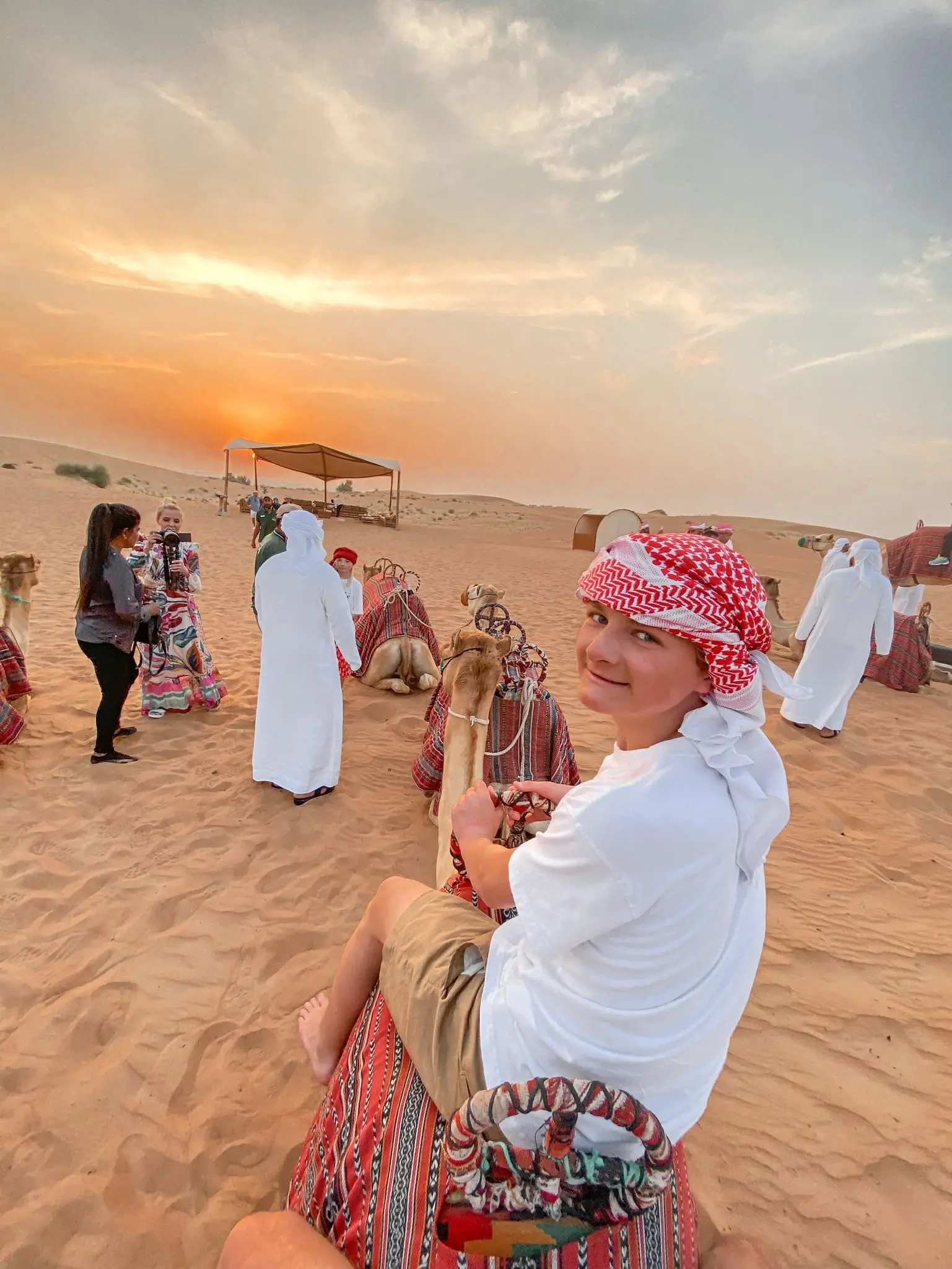 planning a trip to the middle east, where to go in the middle east, how to plan a trip to the middle east, dubai, united arab emirates, UAE, erin busbee, busbee style, busbee family travels, desert safari, platinum heritage desert safari, riding camels in desert, the empty quarter
