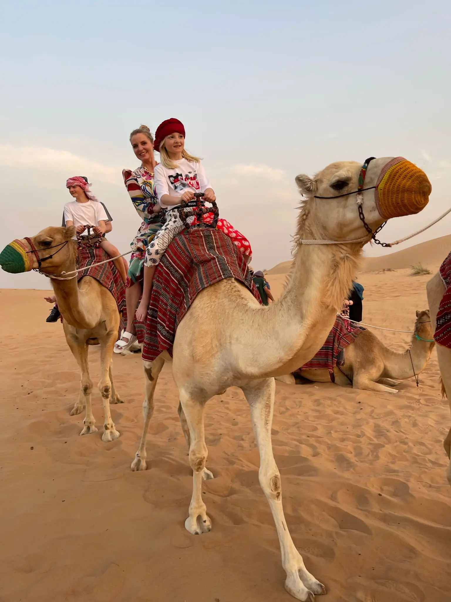 planning a trip to the middle east, where to go in the middle east, how to plan a trip to the middle east, dubai, united arab emirates, UAE, erin busbee, busbee style, busbee family travels, desert safari, platinum heritage desert safari, riding camels in desert, the empty quarter