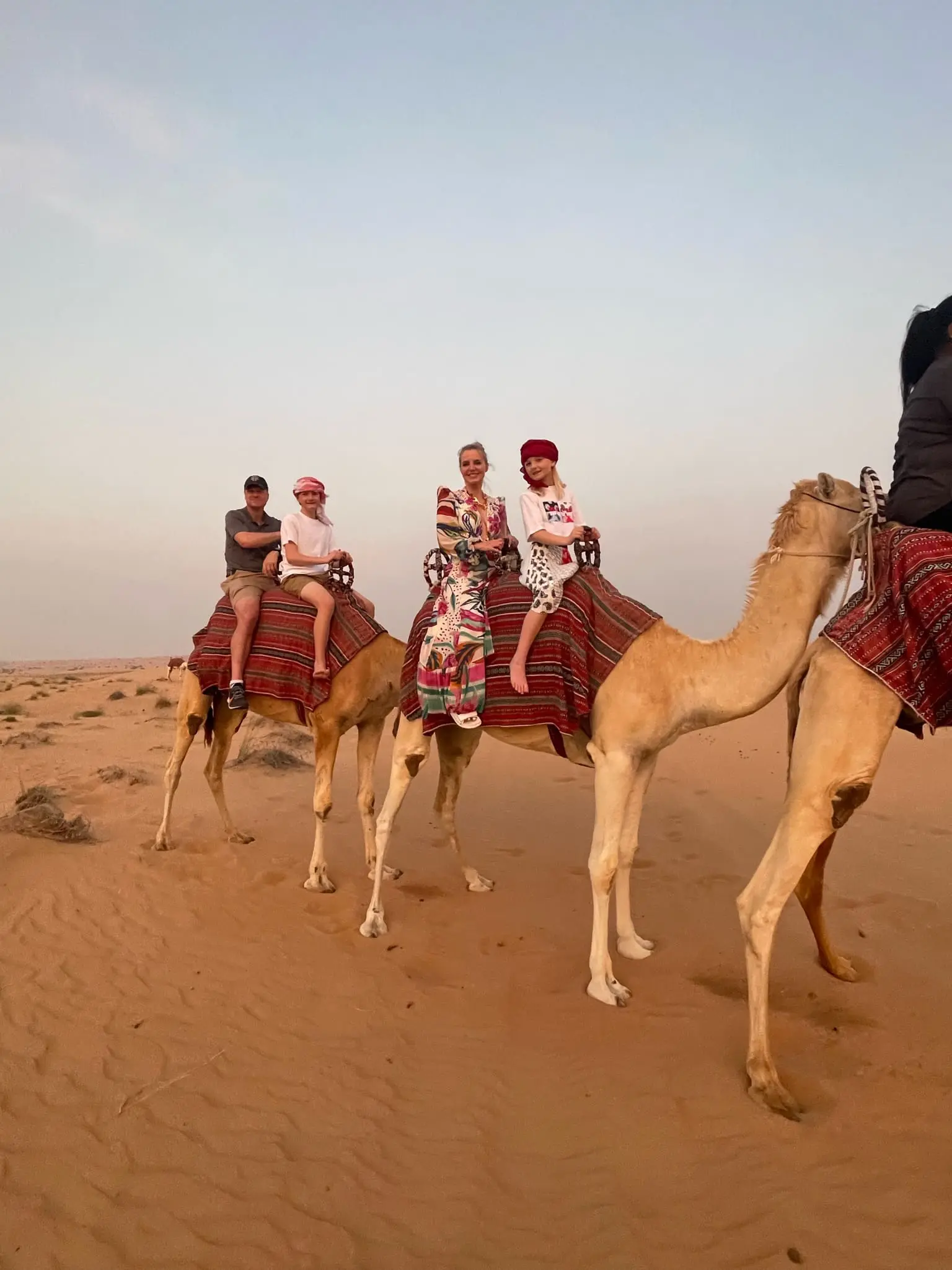 planning a trip to the middle east, where to go in the middle east, how to plan a trip to the middle east, dubai, united arab emirates, UAE, erin busbee, busbee style, busbee family travels, desert safari, platinum heritage desert safari, riding camels in desert, the empty quarter