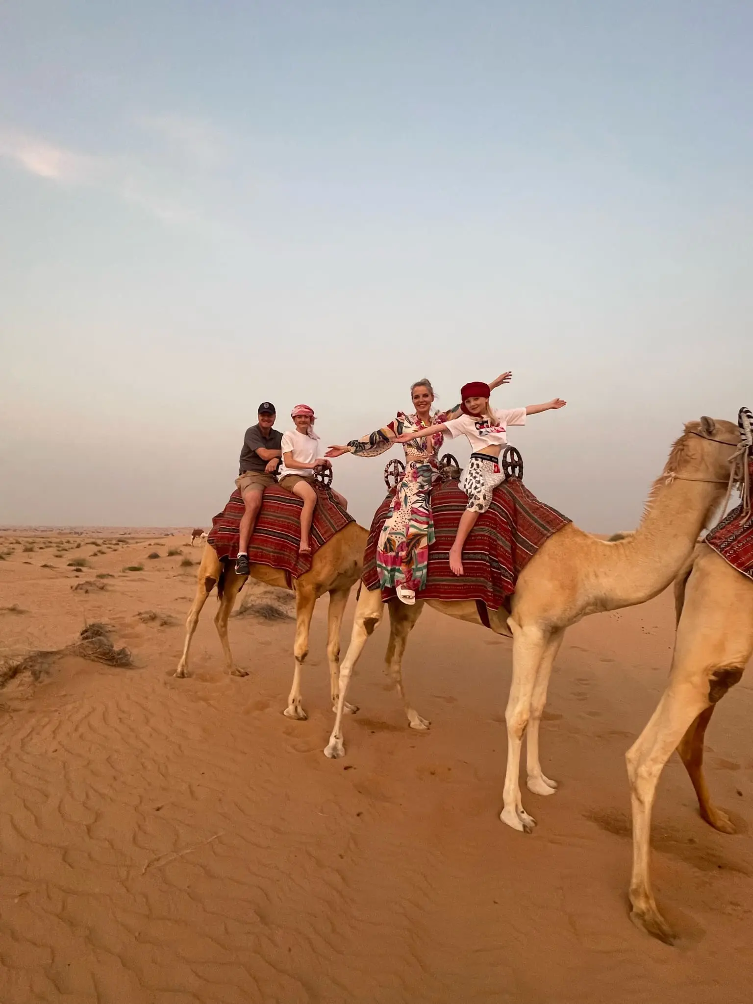 planning a trip to the middle east, where to go in the middle east, how to plan a trip to the middle east, dubai, united arab emirates, UAE, erin busbee, busbee style, busbee family travels, desert safari, platinum heritage desert safari, riding camels in desert, the empty quarter
