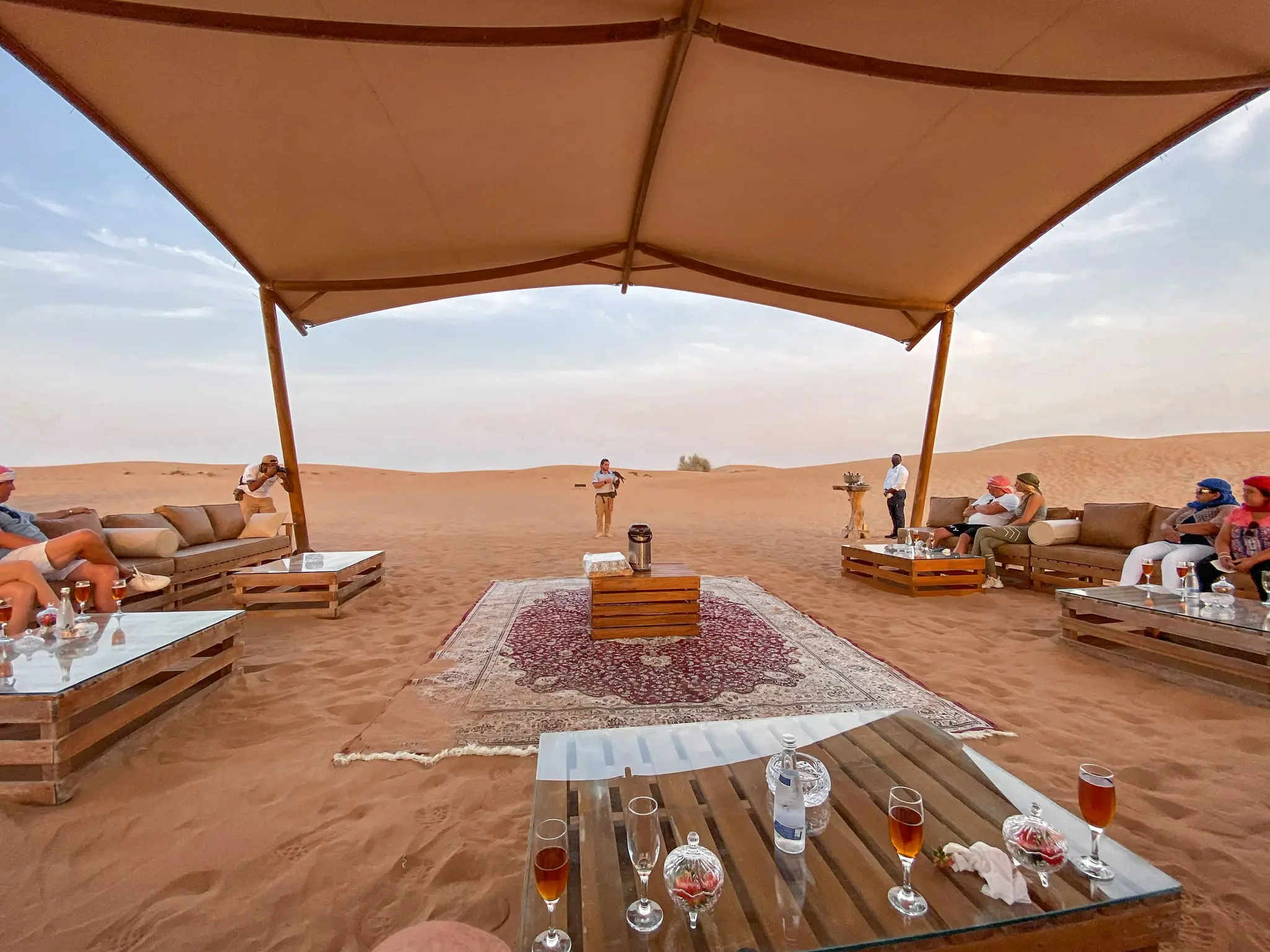 planning a trip to the middle east, where to go in the middle east, how to plan a trip to the middle east, dubai, united arab emirates, UAE, erin busbee, busbee style, busbee family travels, desert safari, platinum heritage desert safari, riding camels in desert, dinner in the desert, the empty quarter