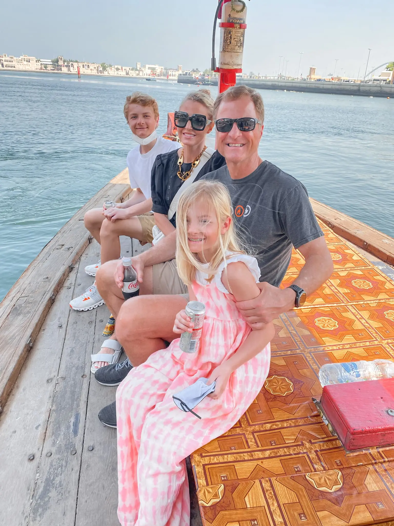 planning a trip to the middle east, where to go in the middle east, how to plan a trip to the middle east, dubai, united arab emirates, UAE, erin busbee, busbee style, busbee family travels, dubai city tour, visit dubai waterfront, boat on dubai waterfront
