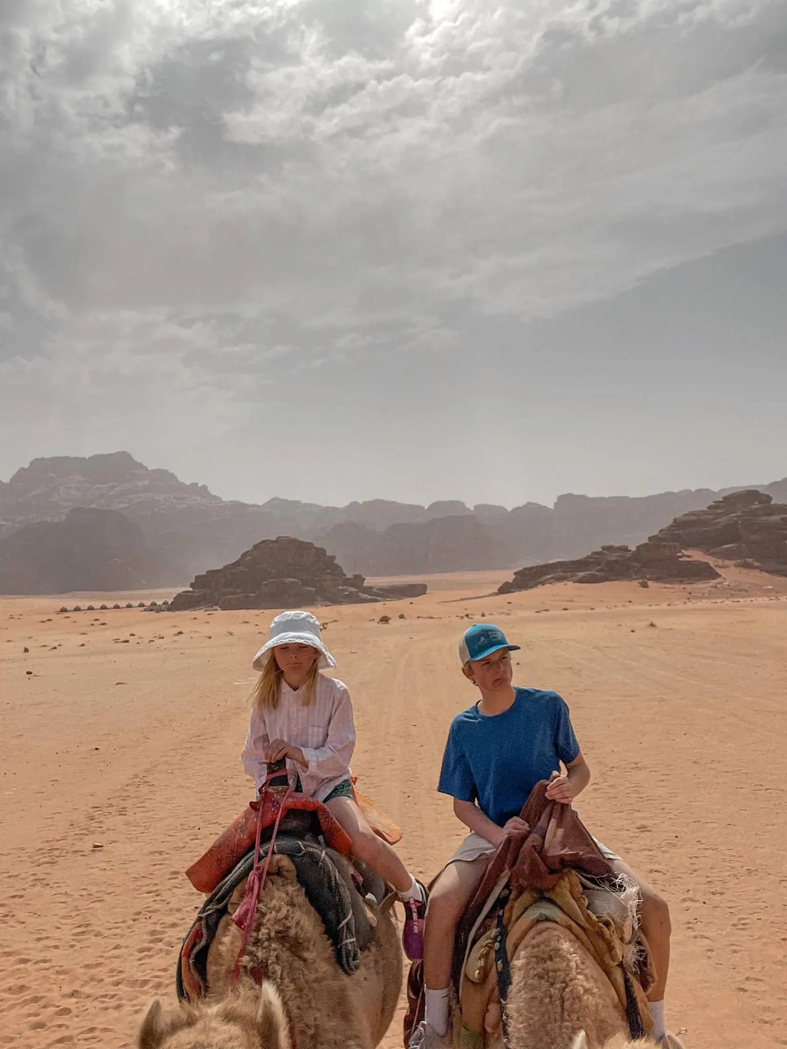 planning a trip to the middle east, where to go in the middle east, how to plan a trip to the middle east, Jordan, Jordan Desert, erin busbee, busbee style, busbee family travels, Jordan Desert trip, explore jordan desert, camel rides in jordan desert, wadi rum, Valley of the moon