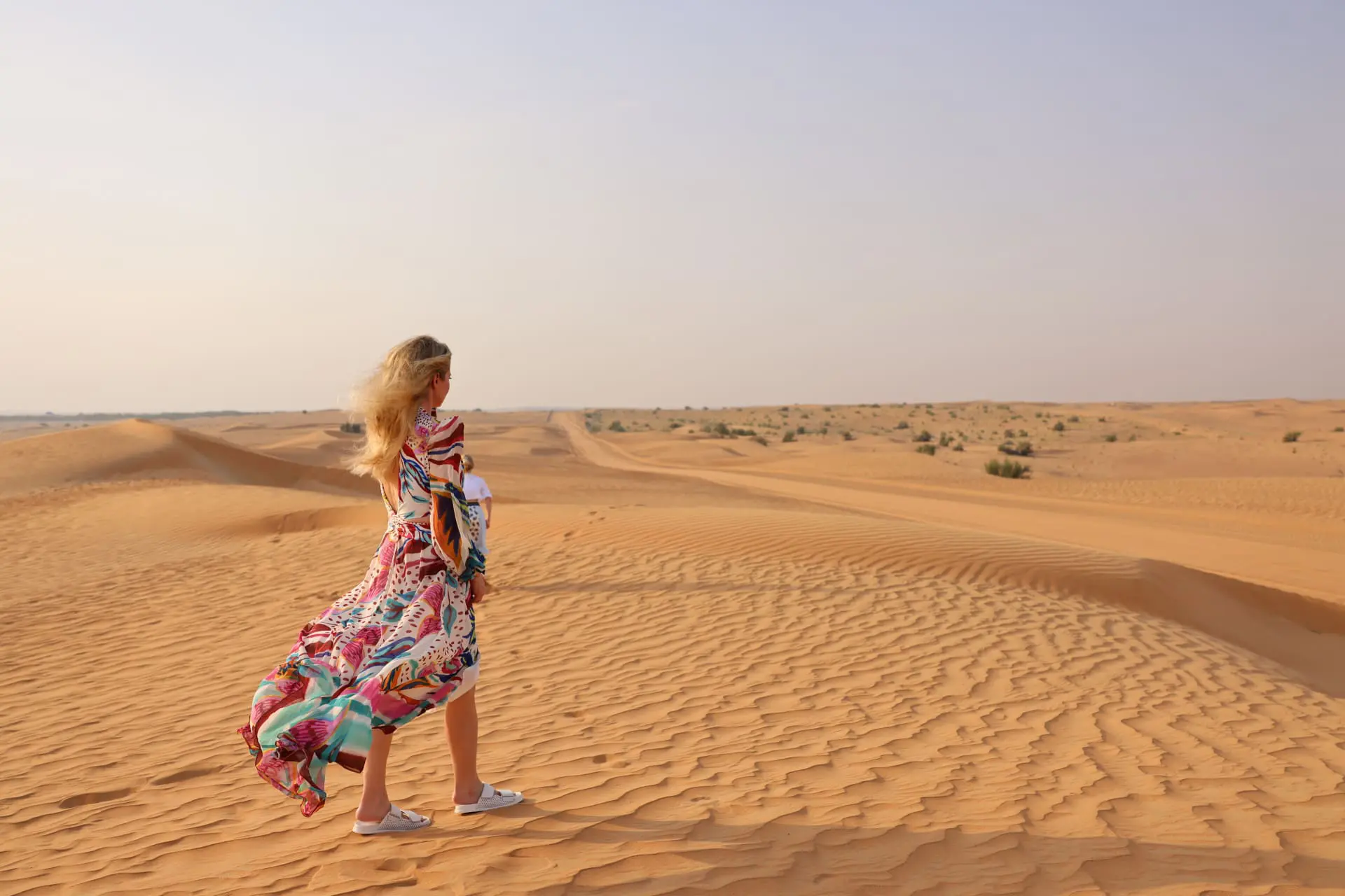 how to dress in middle east, womens dress code in middle east, middle eastern dress female, how to blend in in the middle east, shoes to wear in middle east, what to wear in middle east, how to look stylish in middle east, erin busbee, busbee style, patbo dress, headscarf, paco rabbane chunky necklace, mercedes castillo white slide sandals, riding camels in desert