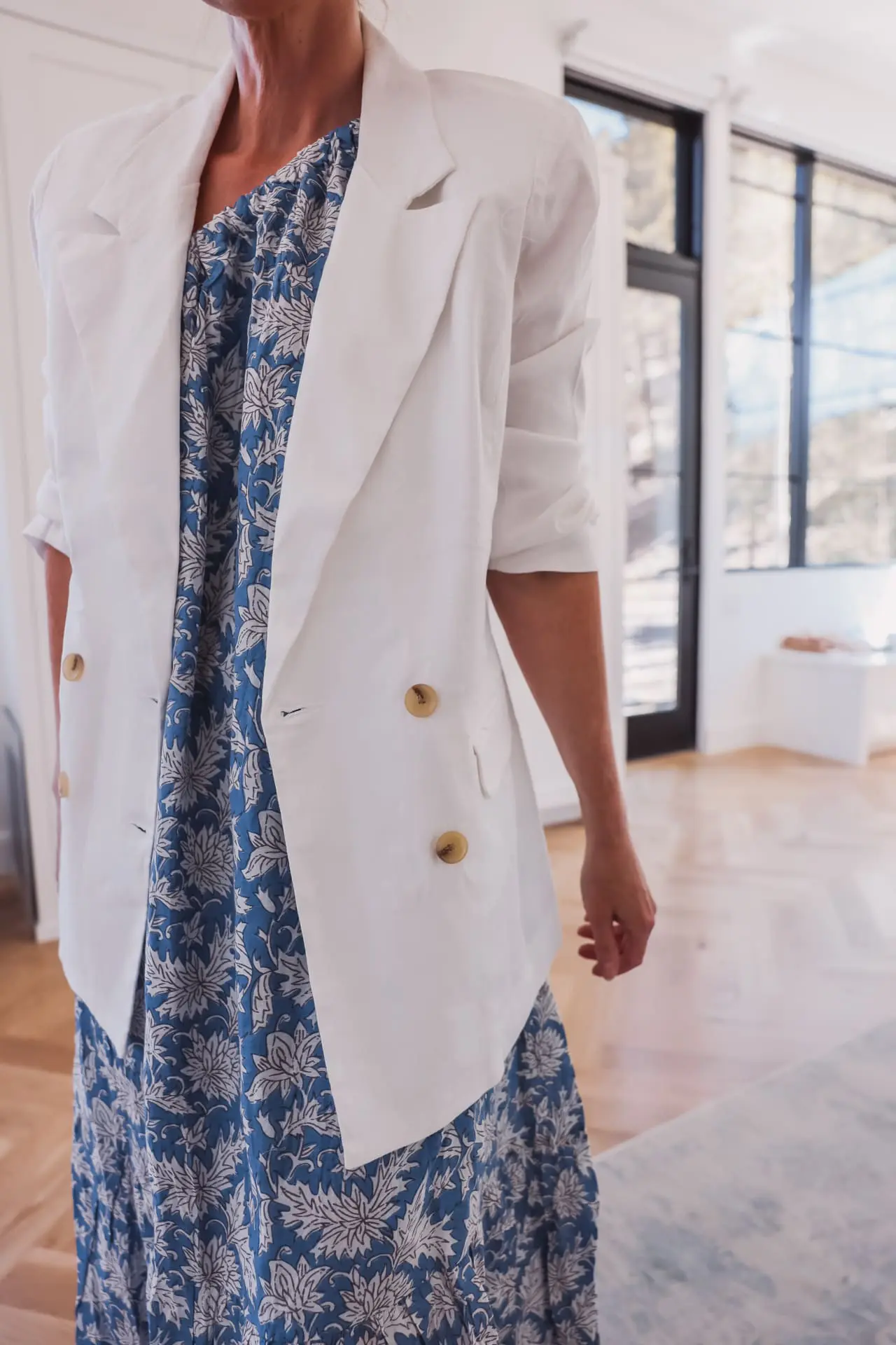 white blazer outfits, easy summer outfits for busy moms, easy summer outfits, summer mom outfits 2022, summer mom outfits, casual summer outfit ideas, cute mom outfits for summer, easy mom outfits, mom outfit ideas, casual mom outfits summer, summer outfit 2022, casual summer outfits for over 40, casual summer outfits for over 30, blue printed maxi dress by velvet, marc fisher mesh strappy heels, le specs sunglasses, erin busbee, busbee style, fashion over 40, telluride, colorado, evereve white double breasted blazer, How to wear a white blazer in summer, White blazer outfit summer, casual white blazer outfit, white blazer with jeans, how to wear a white blazer, ways to wear a white blazer