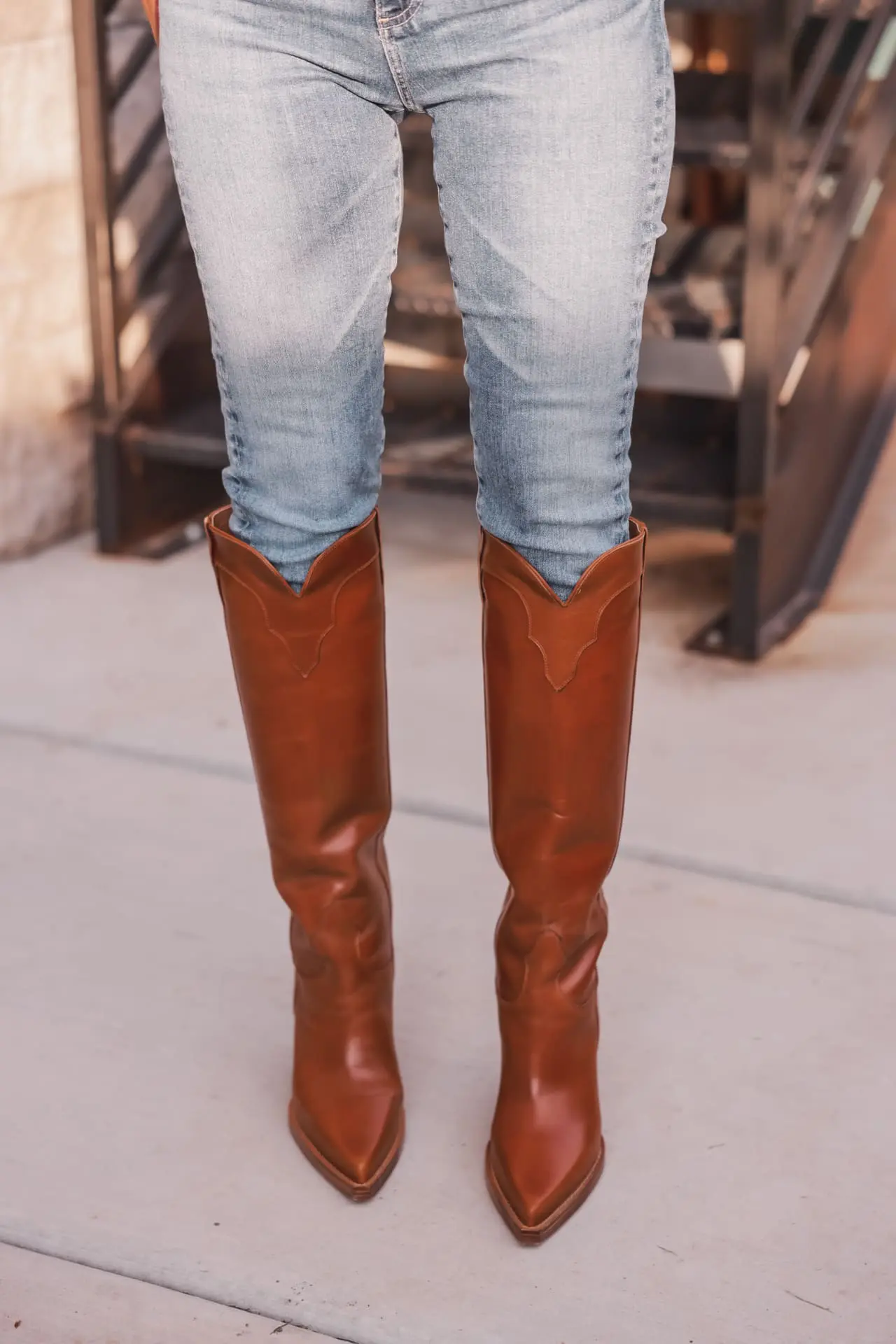 killer brown boots, paris Texas, paris Texas dorado boots, western inspired boots, womens leather boots, cute boots for women, best brown boots, luxury brown boots, erin busbee, busbee style, fashion over 40, trendy brown boots, classic brown boots, elliatt lace blouse, moussy vintage jeans, telluride, colorado