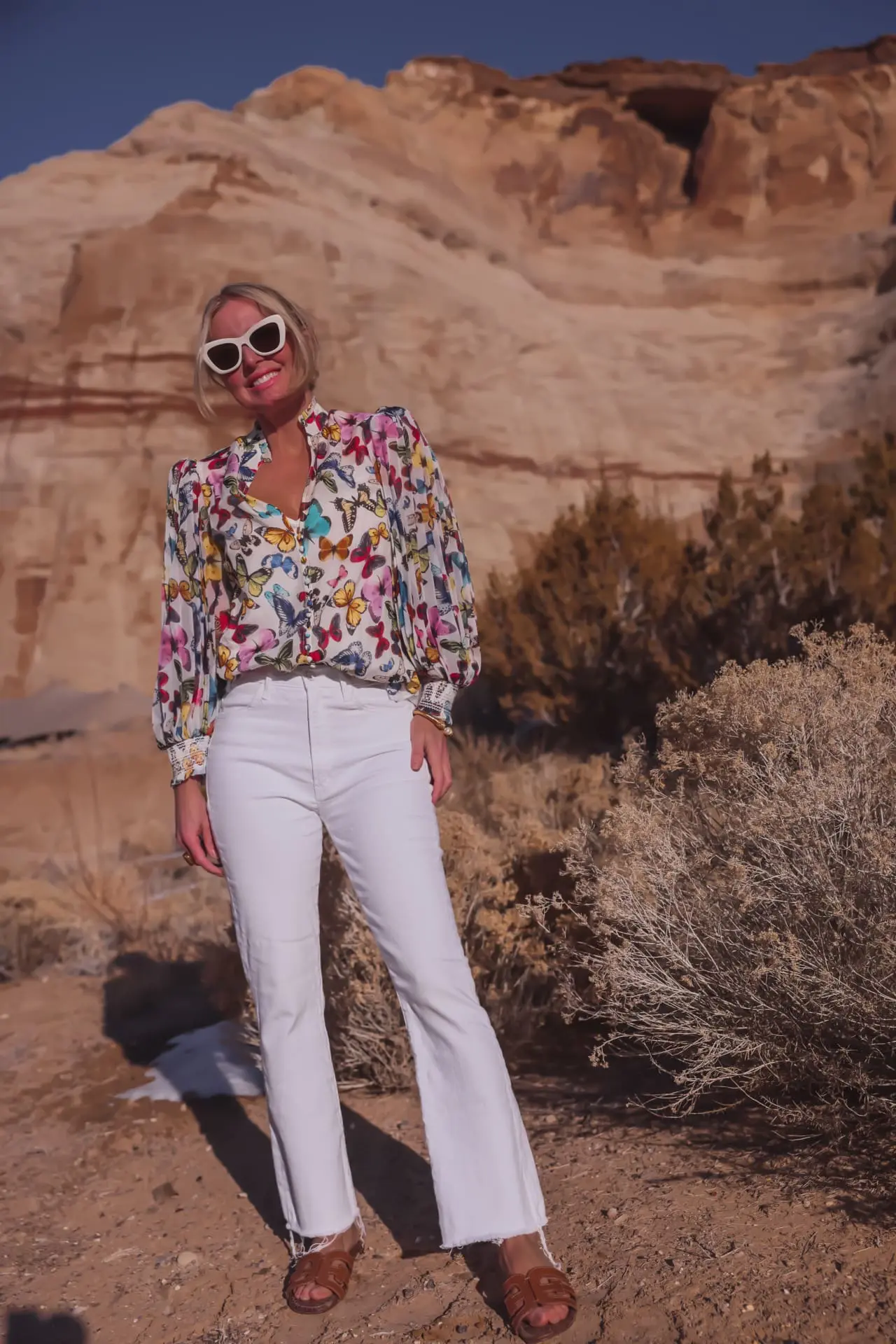 white jeans and printed top