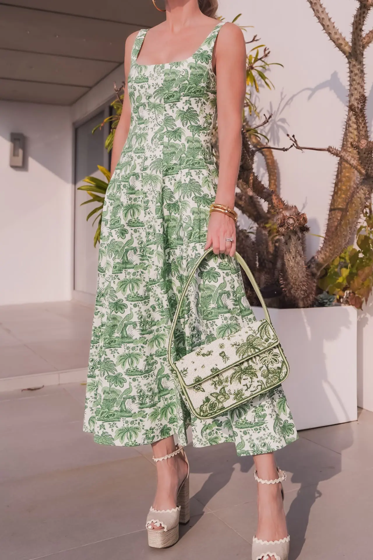 green dress and beaded bag