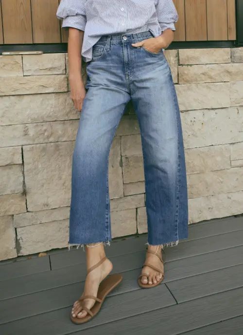 AG Hattie Crop Jeans in suble barrel shape with tkees sandals
