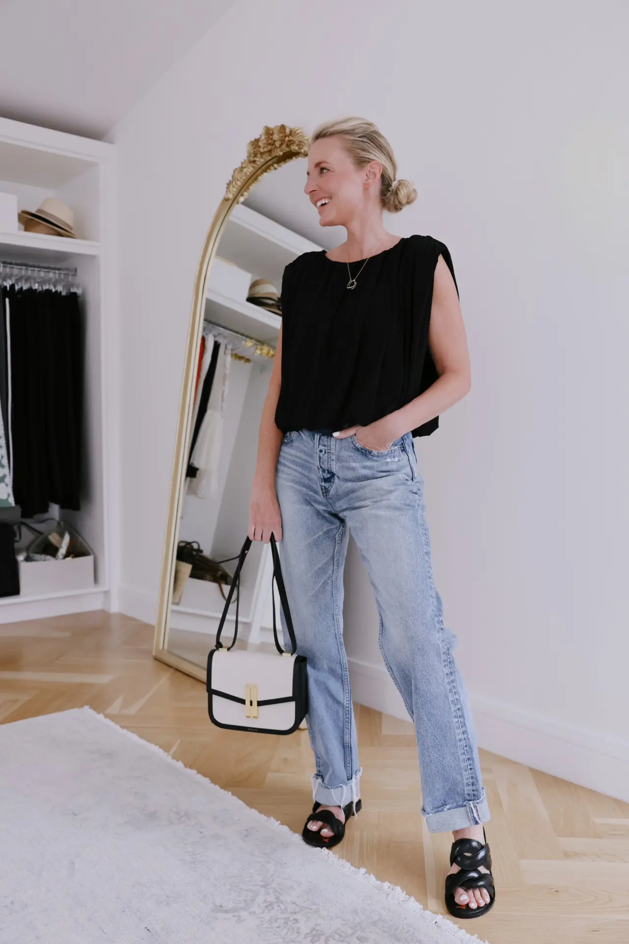 erin busbee wearing moussy vintage cuffed jeans, summer denim trends of 2025