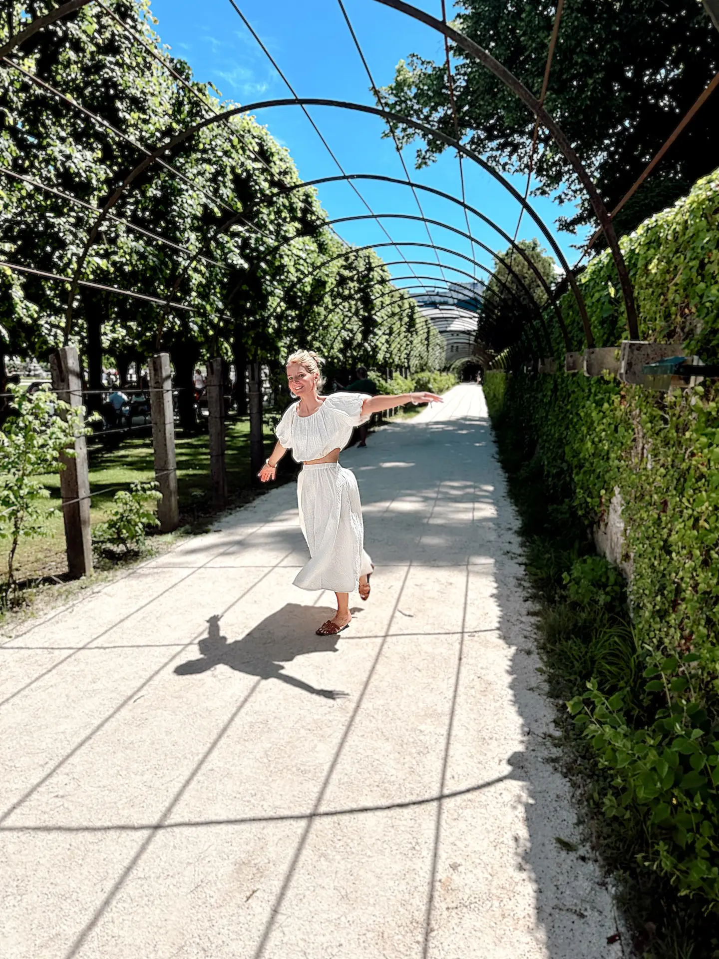 European Inspired outfits, visiting Sound of Music tour in Salzburg in white 2 piece top and skirt set