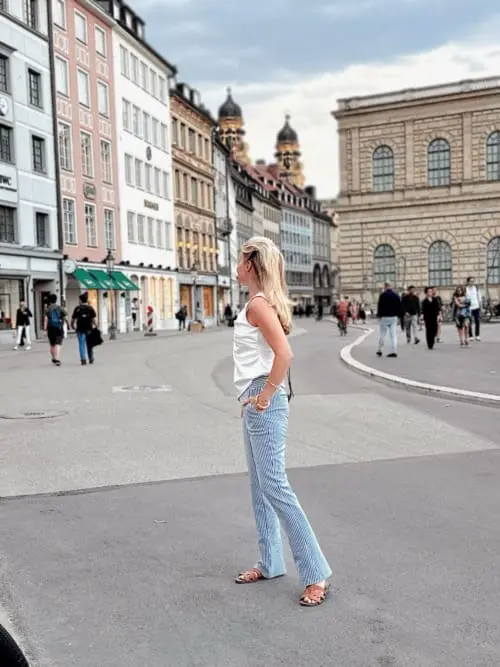 striped blue and white pants and white sleeveless top both by THEO the label, European Inspired Outfits