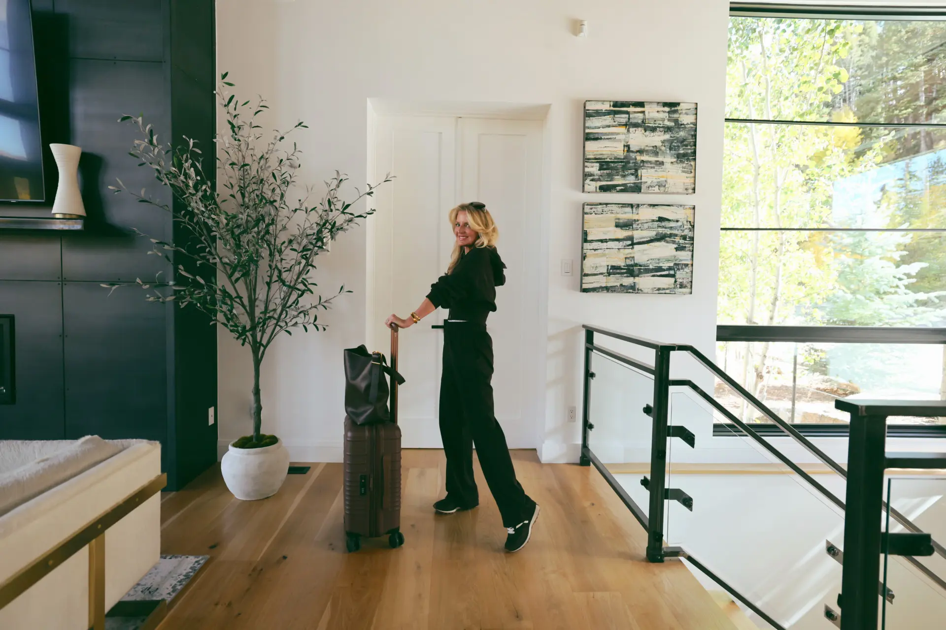 Matching sweatsuit brown by Lilysilk with Beis suitcase