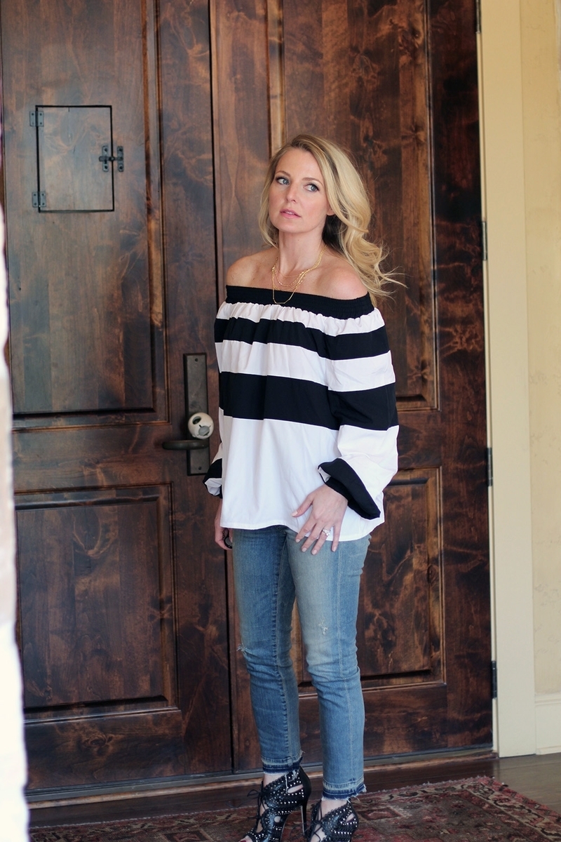 erin busbee of busbeestyle wearing an MLM label off shoulder top and skinny cropped jeans by citizens of humanity with gorjana necklace