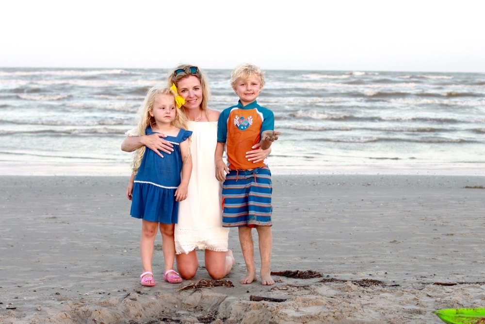 white dress at the beach with kids