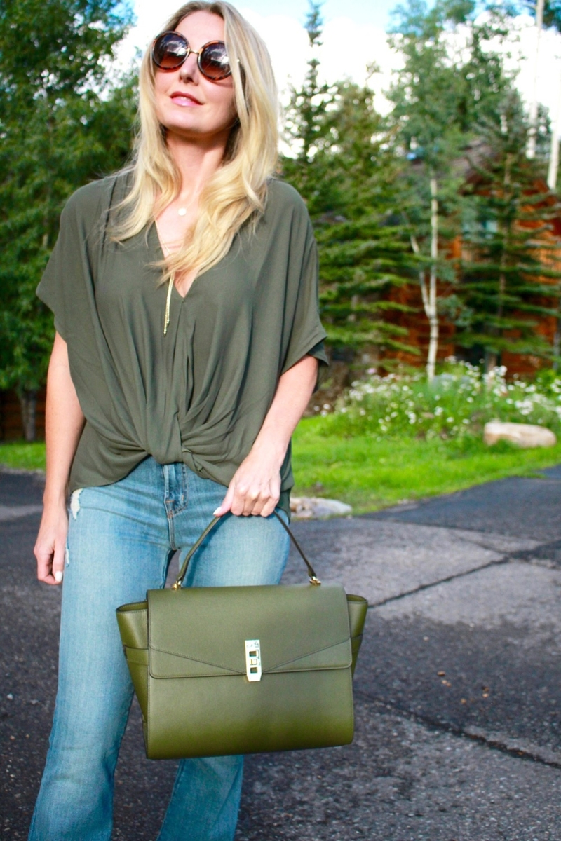 Green Handbag, dark green, army green, uptown satchel, top handle bag, flared jeans, v-neck blouse, green top, round sunglasses