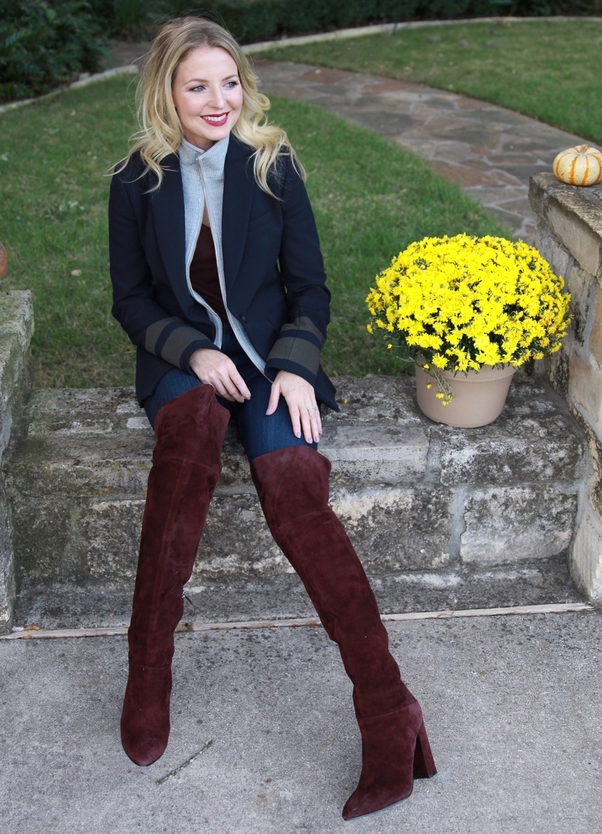erin busbee wearing navy from head to toe, navy and gray blazer by veronica beard, dark blue skinny jeans, paired with burgundy boots