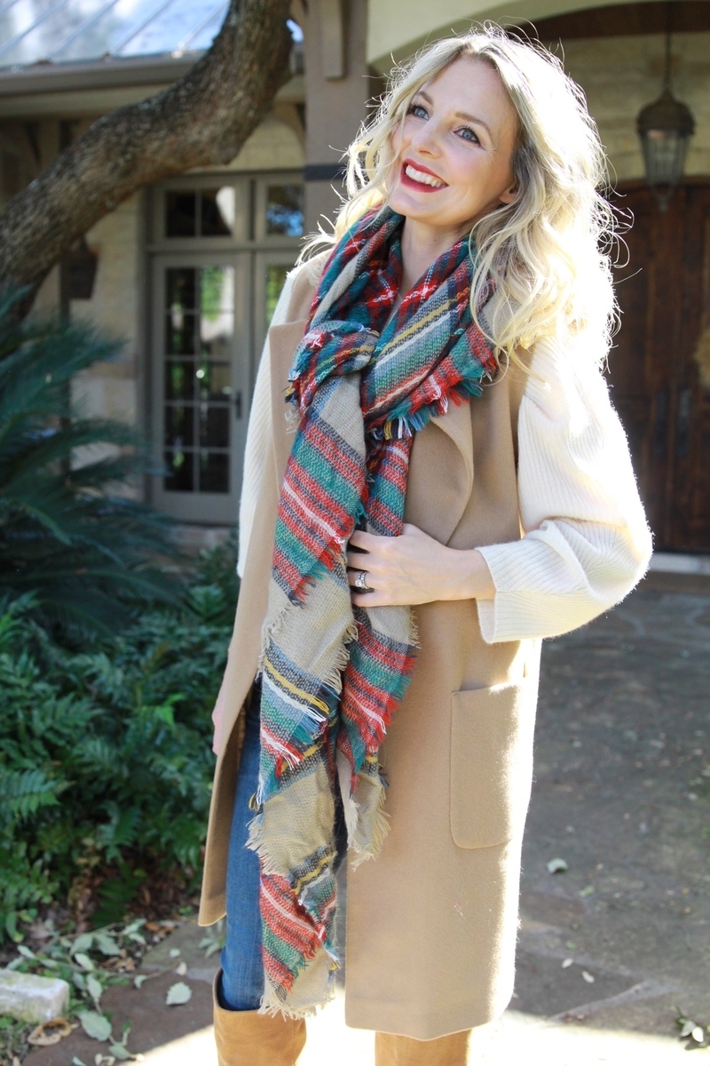 red and green plaid blanket scarf loosely tied with a longline camel vest from nordstrom 