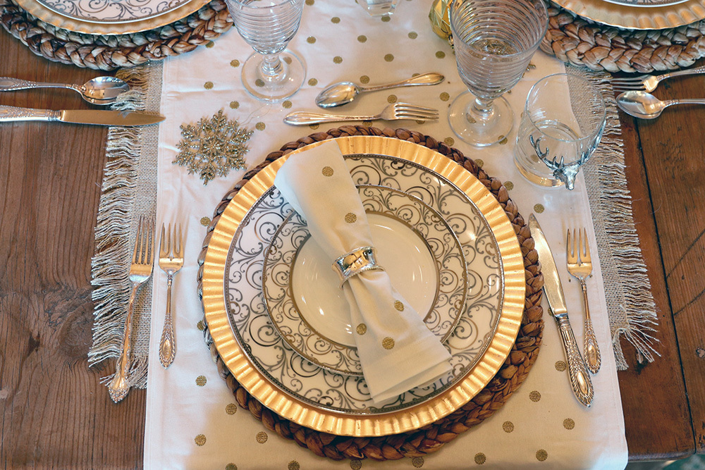 silver and gold holiday table idea that is rustic country and cozy with polka dot napkins from pottery barn and plastic chargers from HEB