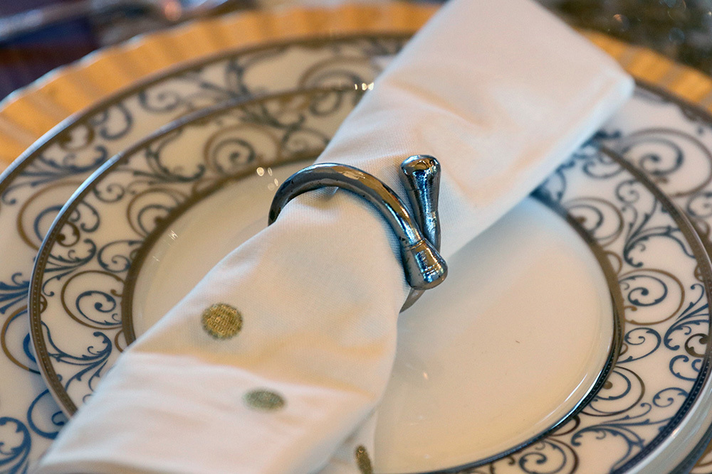 silver and gold place setting