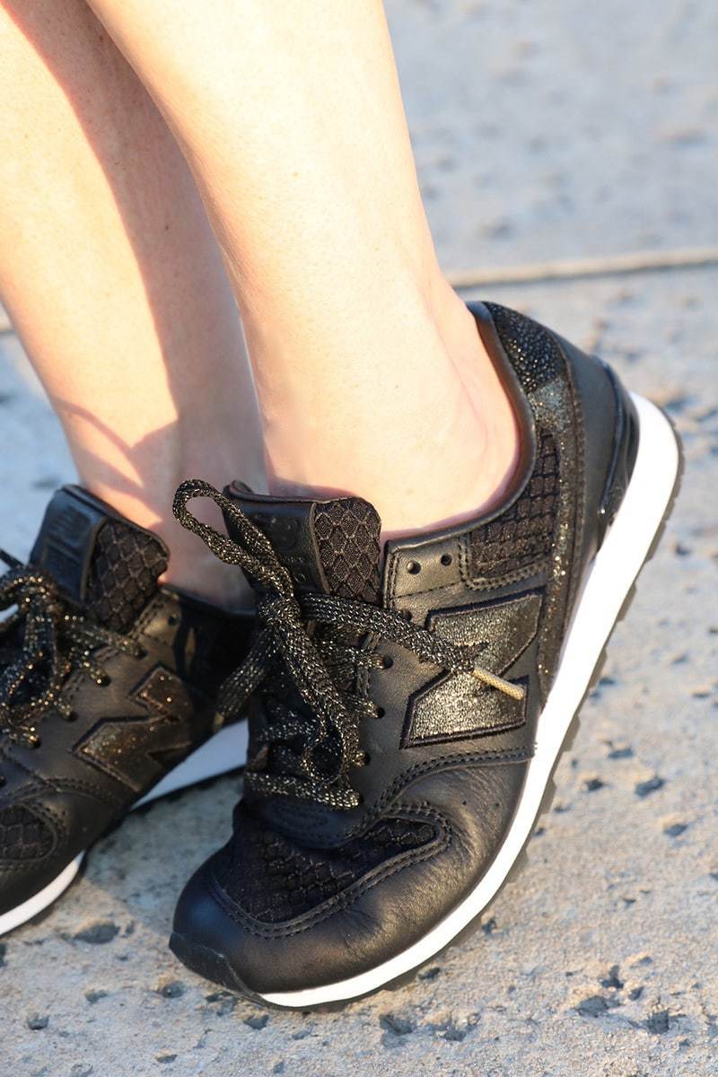 black and gold new balance sneakers sold exclusively at neiman marcus, These are incredibly chic and comfortable and will make trying the athleisure trend a cinch