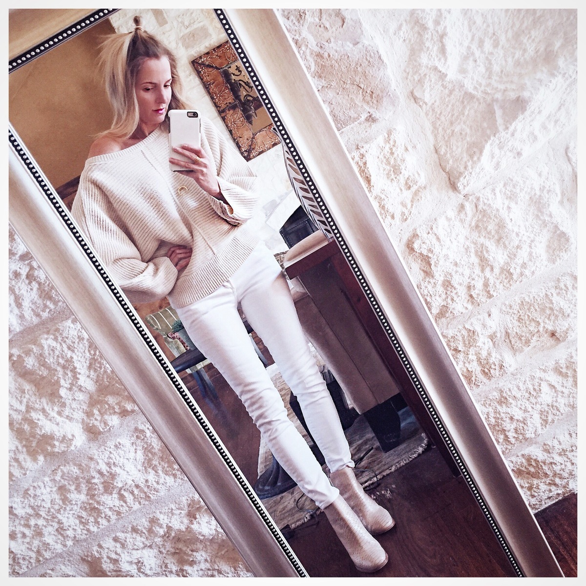 snakeskin, embossed, white booties by Pour La Victoire look AMAZING with an all winter white look! I love mixing white tones as well. My sweater is ivory and my jeans by Citizens of Humanity are bright white. Wear your sweater a little off-shoulder to add a dash of sexy!