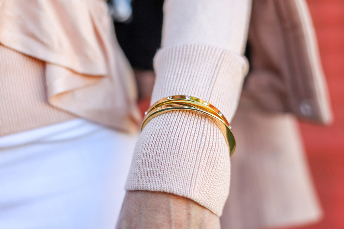 gold bangles from kate spade with hinge clasps are easy to get on and off and will layer easily together or over a thin sweater or top