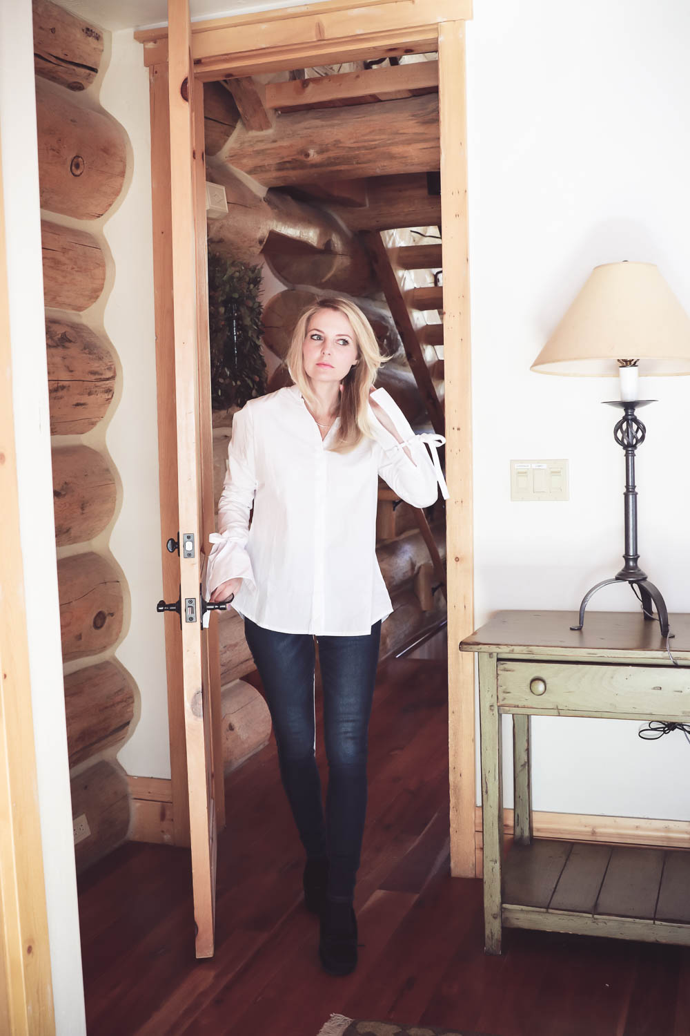 Laceup top by MLM in white button down poplin worn by Erin Busbee, fashion blogger and youtuber based in San Antonio, Texas. The laceup detail is a big fashion trend right now. Look for laceup pumps, flats, jeans, pants, tops, sweaters and jackets!