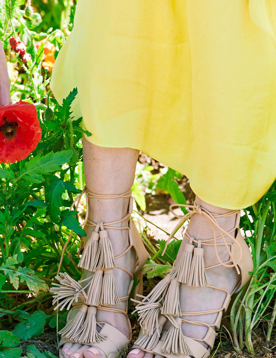 Off shoulder yellow, silky dress by Bardot on fashion blogger and youtuber, Erin Busbee, at Wildseed Farms in Fredericksburg, Texas