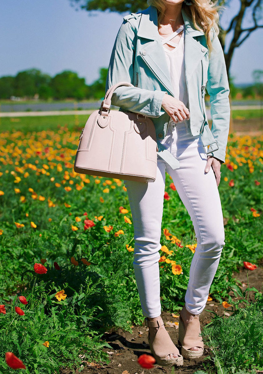 3 ways to wear a moto jacket. This moto jacket in mint green by Blank NYC comes in 8 colors. I paired it with white jeans by AG and a white cross front tee by Socialite 