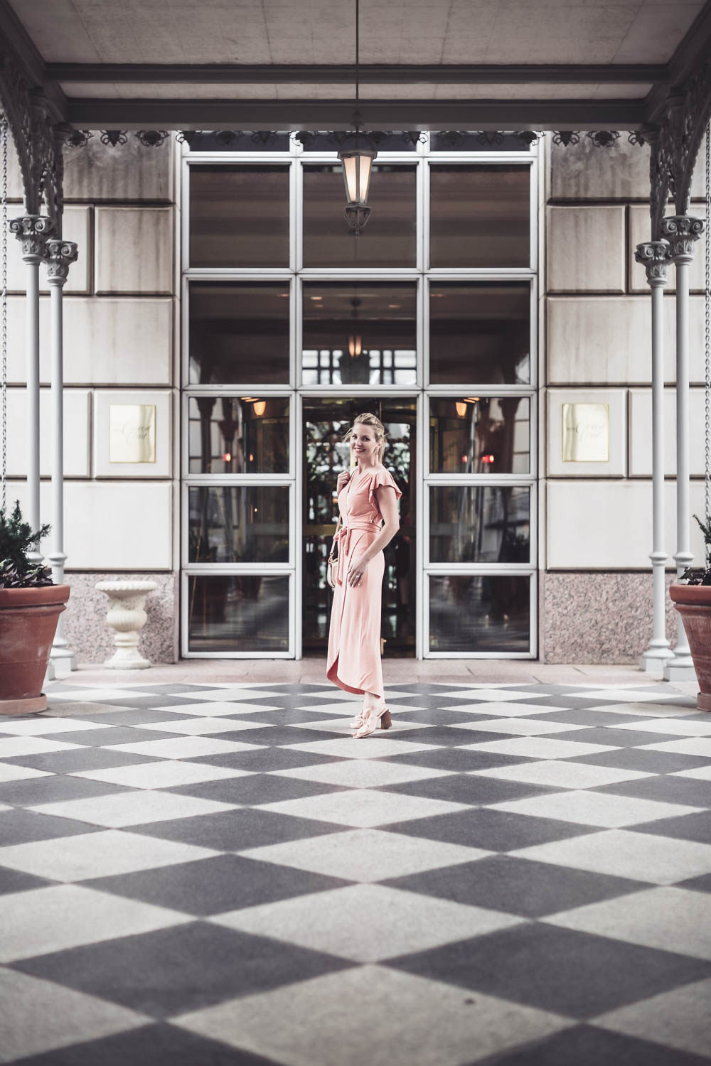 Pink, peach, blush, nude dresses are very much on trend now, I love this Misa wrap dress with the flutter sleeve that I paired with peach bow mules by Avec les filles and the chloe nile bag from Saks Fifth Avenue