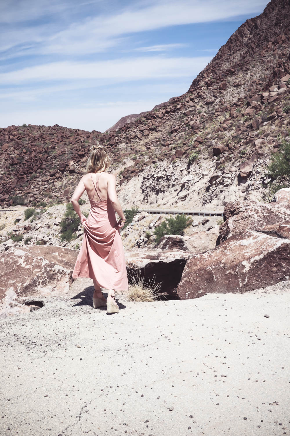 Wrap Dress in blush nude color on fashion blogger and fashion youtuber erin busbee of busbestyle, san antonio, texas, shot near Big Bend National Park in West Texas along the Rio Grande, women's dress ideas 