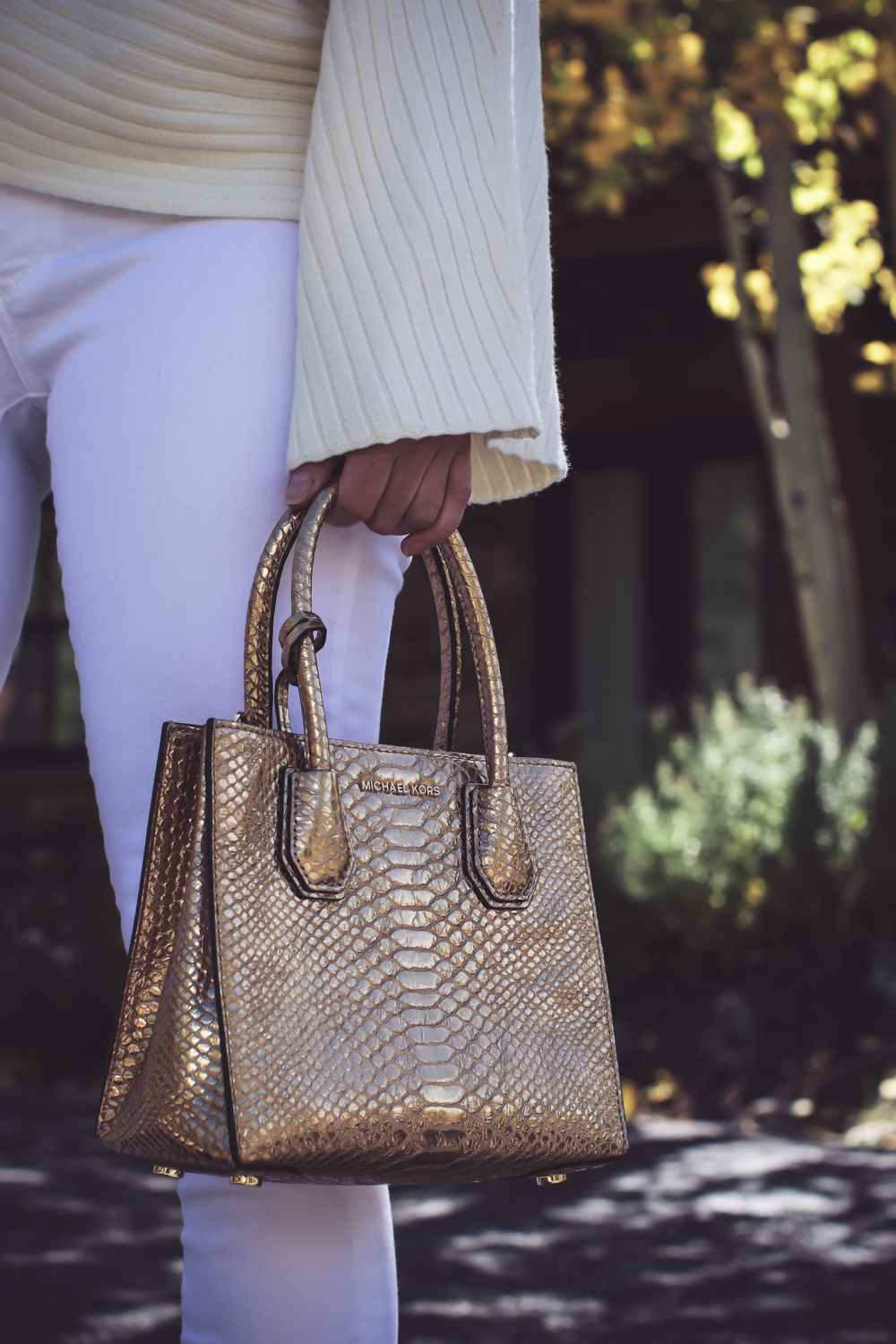 Fall Outfit Ideas, all white look, white jeans and white dolman sleeve sweater from Anthropologie, coupled with a gold structured mini bag from Michael Kors on fashion blogger from Busbee Style,, Erin Busbee, fashion over 40