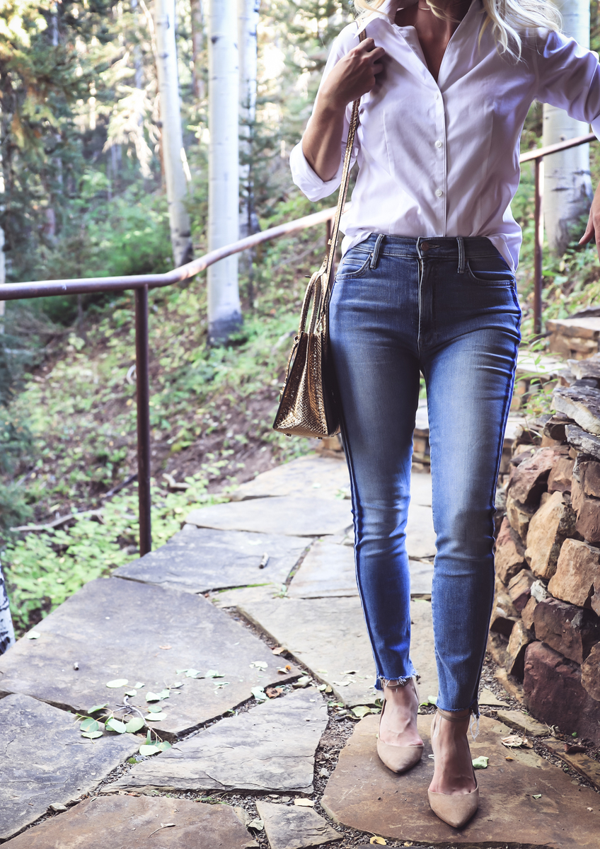 white button down shirt and jeans