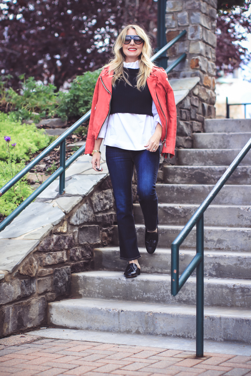 Red moto jacket by Doma, layered over a black free people sweater vest, halogen white ruffle neck blouse and cropped dark wash kickflare rag & bone jeans with sam edelman paris tassel loafers and giles & brother gold bracelets on colorado fashion blogger Erin Busbee of Busbee Style, Fashion over 40