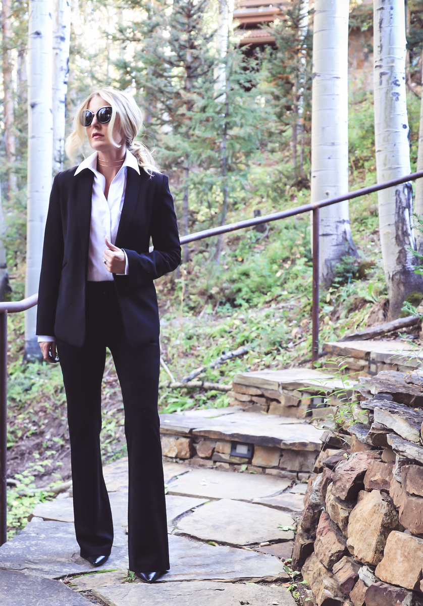 White button down shirt, how to wear a white button down several ways, in this picture, fashion blogger from colorado, Erin Busbee styles the white shirt under a black blazer as part of a woman's suit