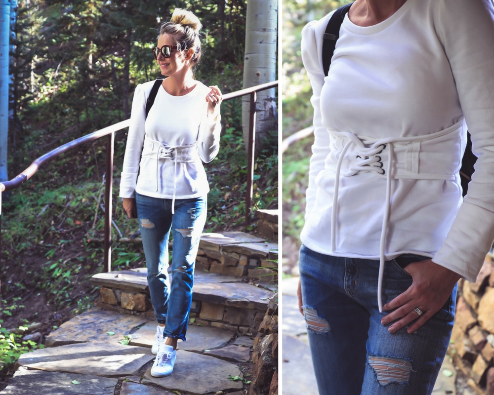 Boyfriend jeans by Current & Elliott, paired with a corset waist sweatshirt from nordstrom and Greats sneakers called royale, on fashion blogger from colorado, Erin Busbee of busbeestyle